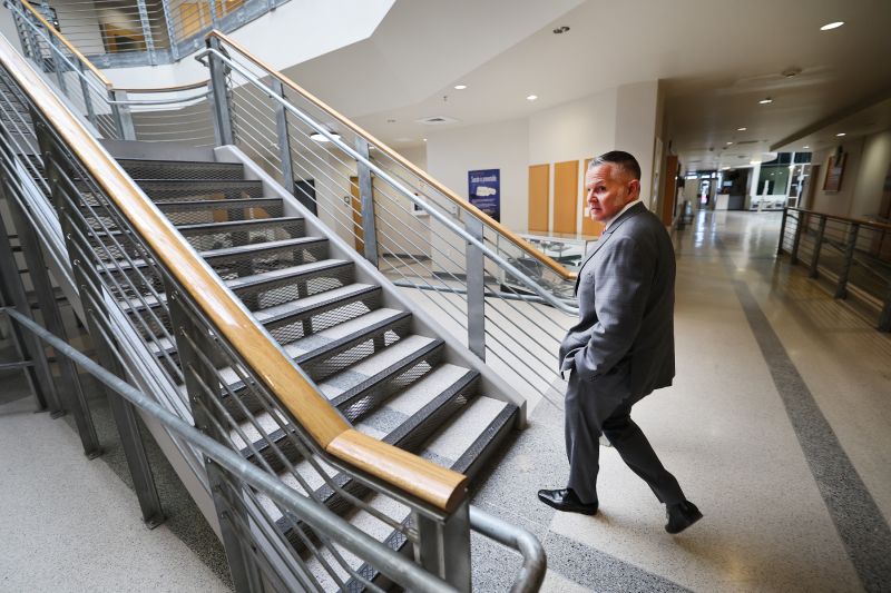 Unified Police detective Ben Pender, who is assigned to the cold case unit, walks toward his office after an interview at the Salt Lake County Sheriff’s Office in South Salt Lake on Tuesday, March 22. - Scott G Winterton, Deseret News