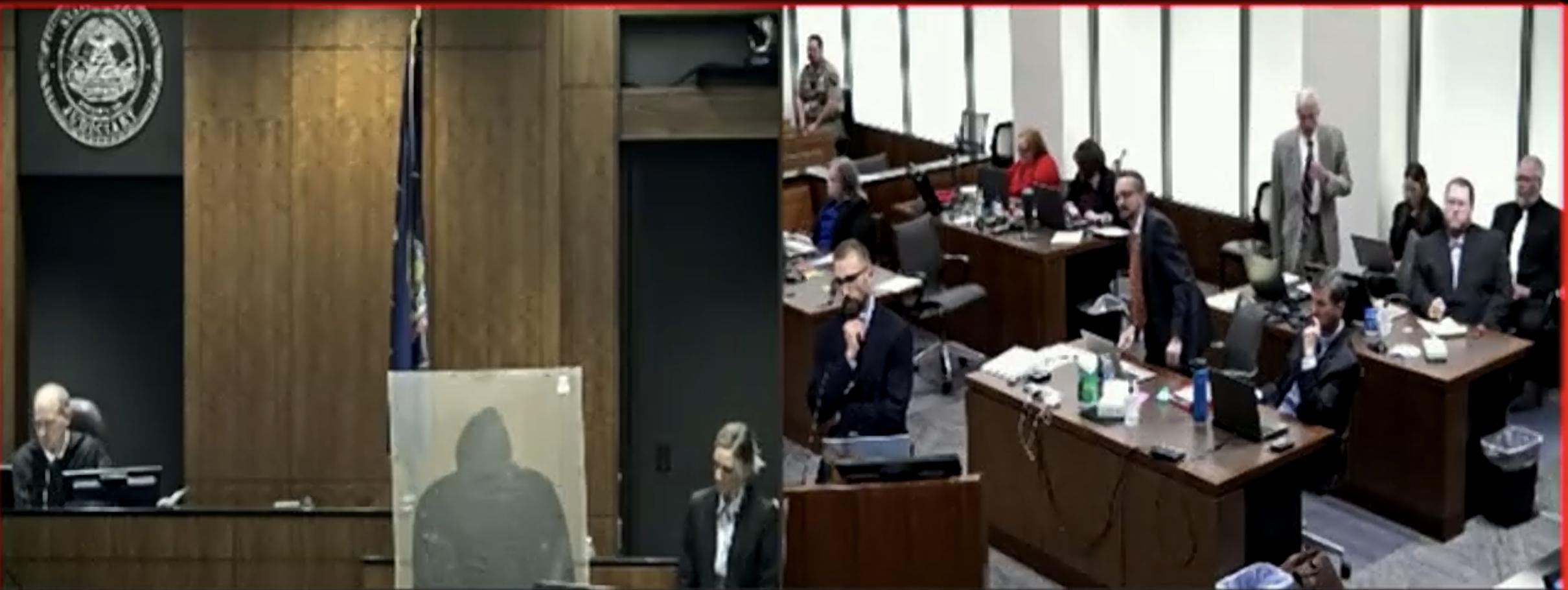 Amanda Neily talks about stains on Brelynne "Breezy" Otteson's sweatshirt in a hearing for Jerrod Baum on Thursday as the Judge, Baum, and attorneys watch. Baum is accused of killing Otteson and Riley Powell over four years ago.