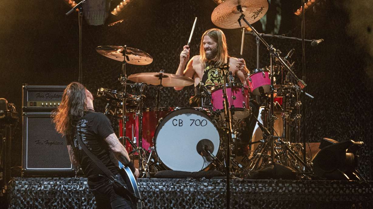 Dave Grohl, left, and Taylor Hawkins of the Foo Fighters perform at the Innings Festival at Tempe Beach Park on Saturday, Feb. 26, 2022.