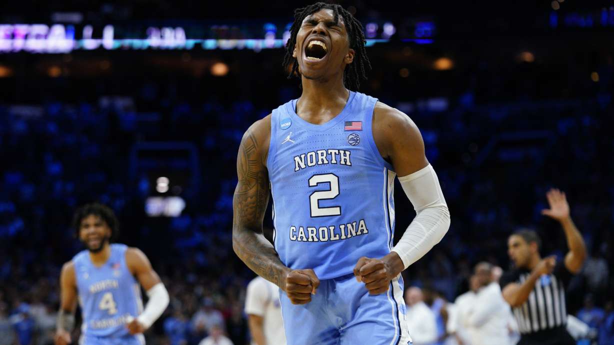 North Carolina's Caleb Love reacts during the second half of a college basketball game against UCLA in the Sweet 16 round of the NCAA tournament, Friday, March 25, 2022, in Philadelphia.