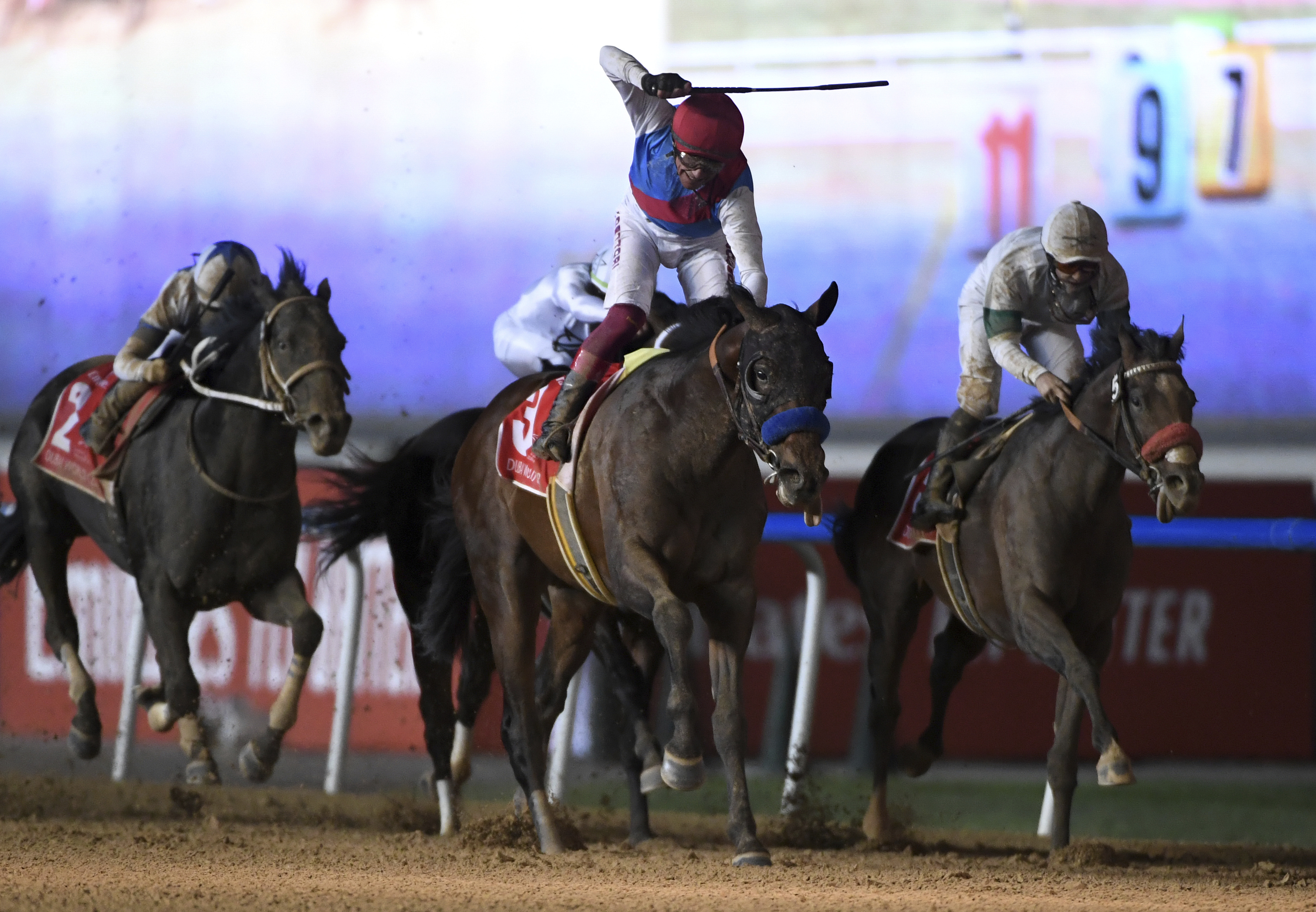 Country Grammer with jockey Frankie Dettori wins Group 1 Dubai World Cup over 2000m (10 furlongs) at Meydan Racecourse in Dubai, United Arab Emirates, Saturday, March 26, 2022. 