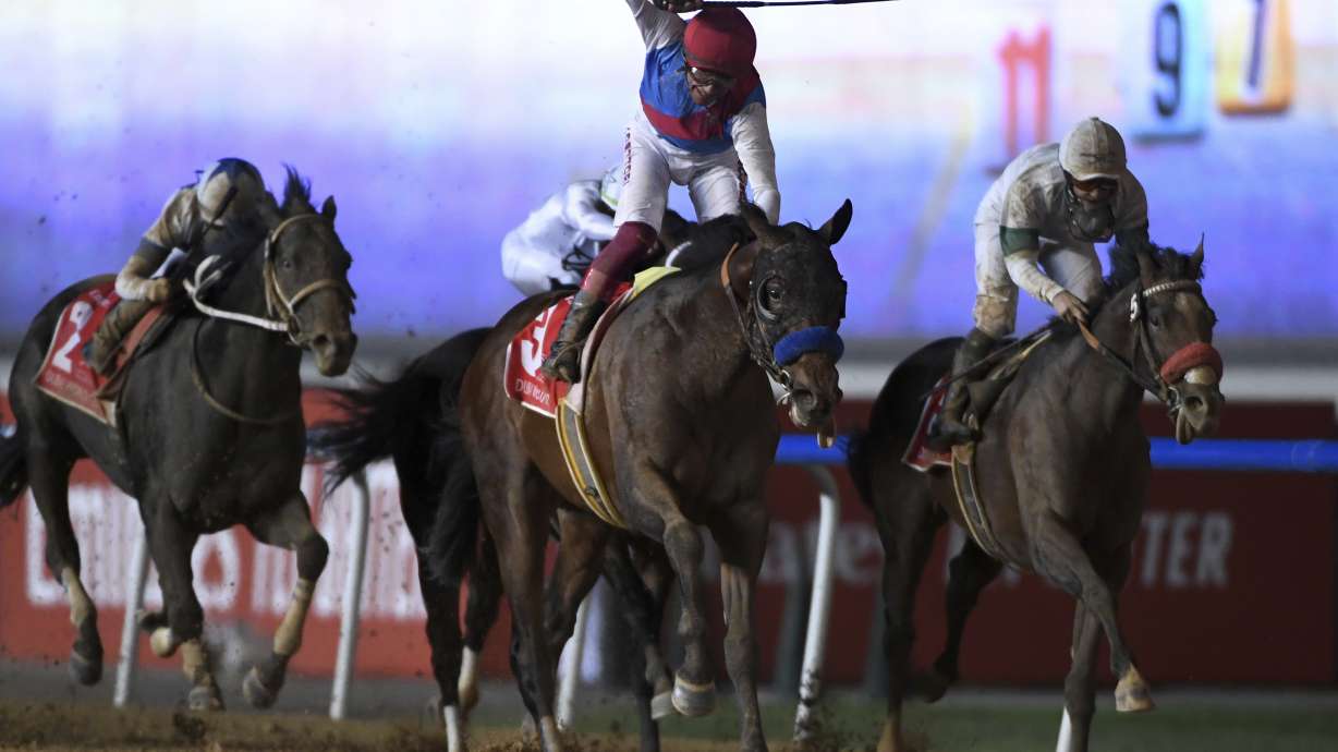 Country Grammer with jockey Frankie Dettori wins Group 1 Dubai World Cup over 2000m (10 furlongs) at Meydan Racecourse in Dubai, United Arab Emirates, Saturday, March 26, 2022.