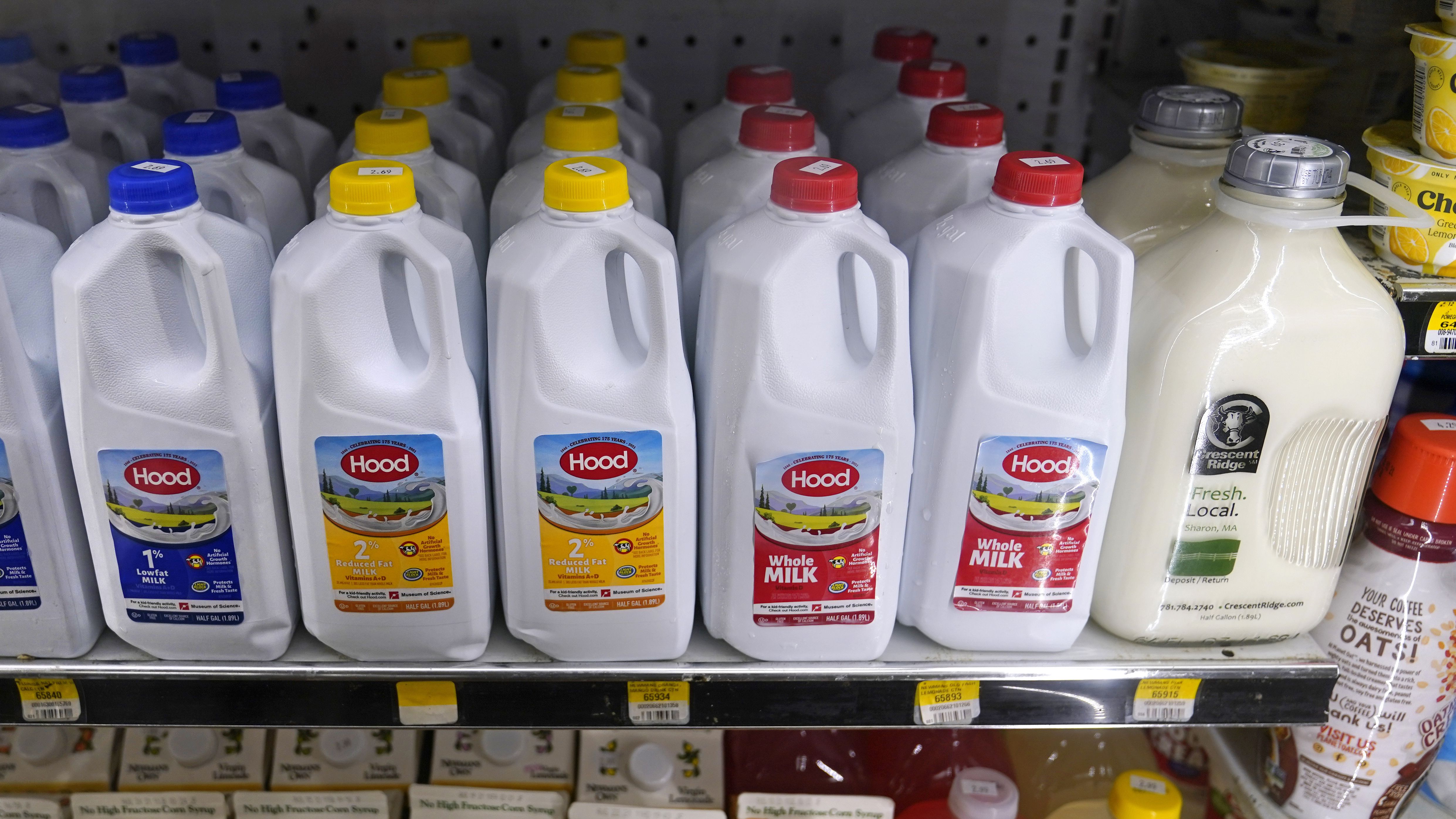 Jugs of milk are displayed in a refrigerated section at Lambert’s Rainbow Market, in Westwood, Mass., on June 15, 2021. U.S. inflation has been running at 40-year highs for months and Utahns are in wide agreement that the escalating prices of goods and services are a cause for concern.