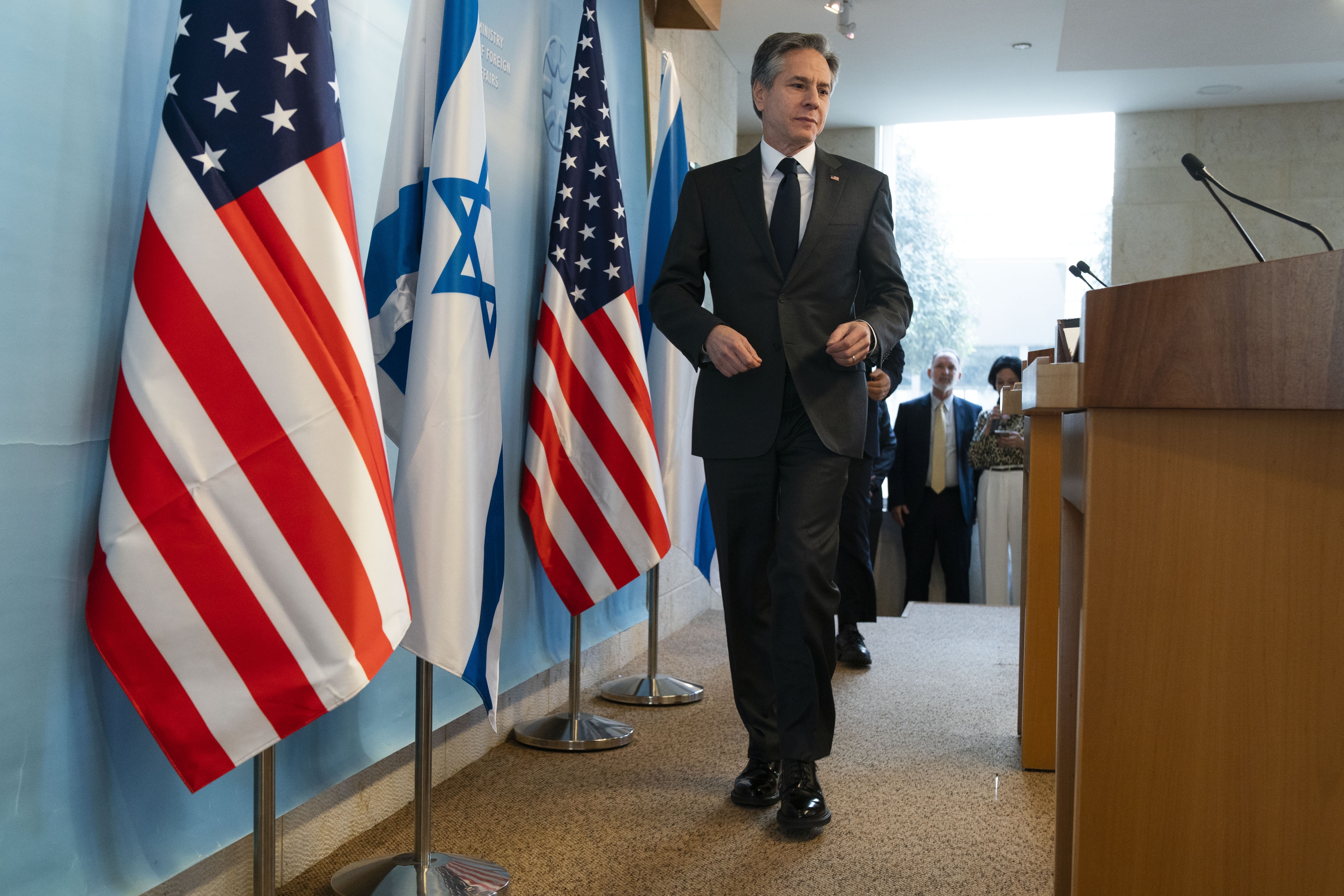 U.S. Secretary of State Antony Blinken and Israel's Foreign Minister Yair Lapid arrive to attend a news conference, Sunday at Israel's Ministry of Foreign Affairs in Jerusalem. 