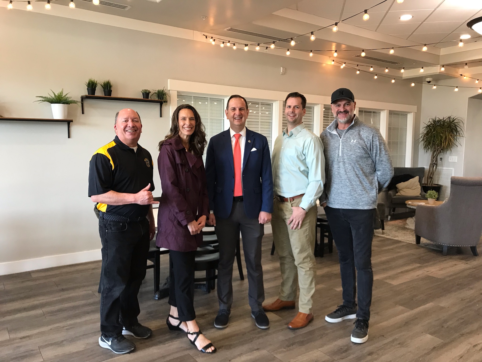 Representatives of the Utah boys volleyball community and legislative reps celebrate the Utah High School Activities Association's sanctioning of the sport beginning with the spring of 2024. From left to right: Wasatch High coach Duke Mossman, UBVA board member Jill Davis, Rep. Norm Thurston, Skyline High coach Josh Henderson, UBVA board member Warren Van Schalkwyk.