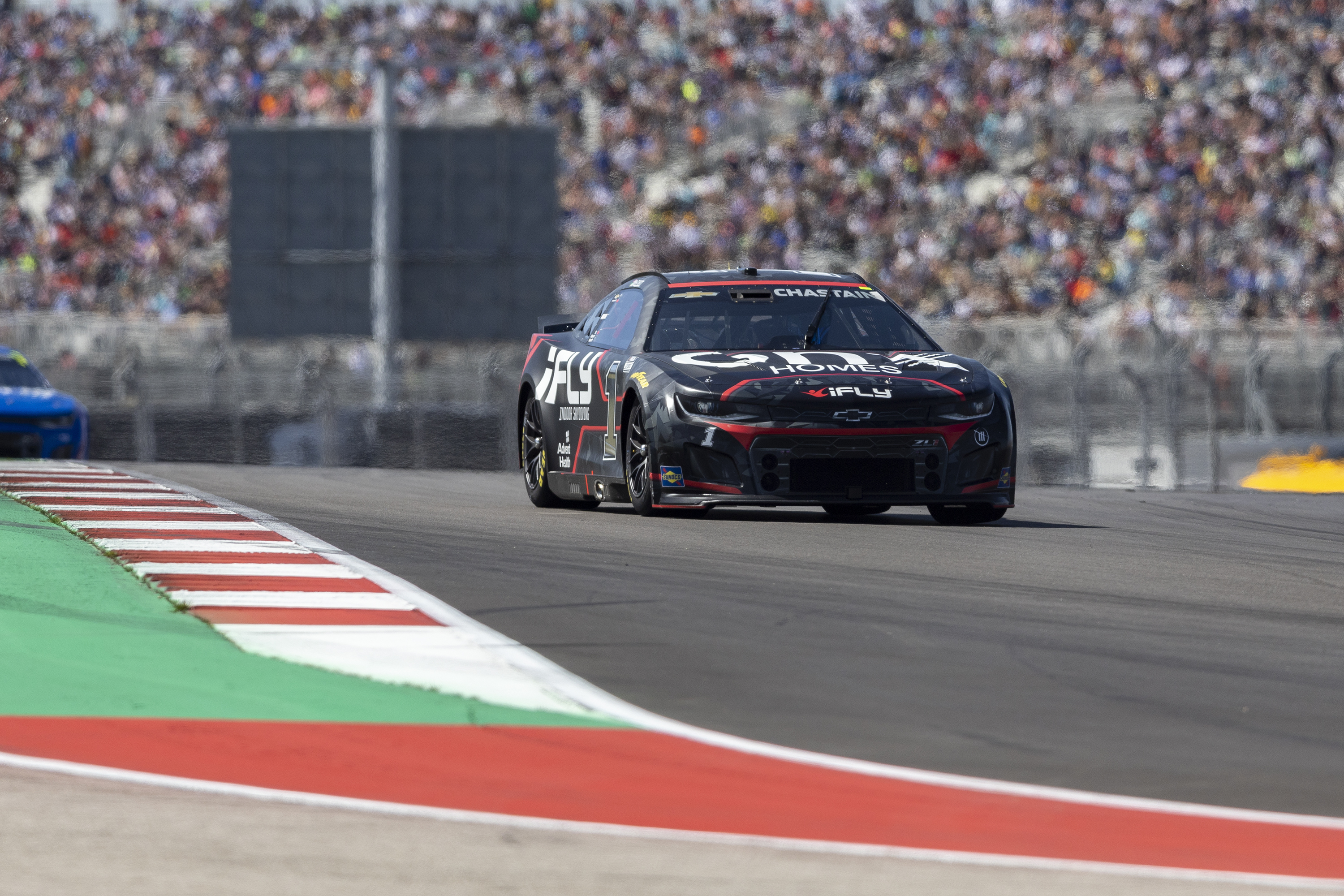 Ross Chastain (1) steers into Turn 7 during a NASCAR Cup Series auto race at Circuit of the Americas, Sunday, March 27, 2022, in Austin, Texas.