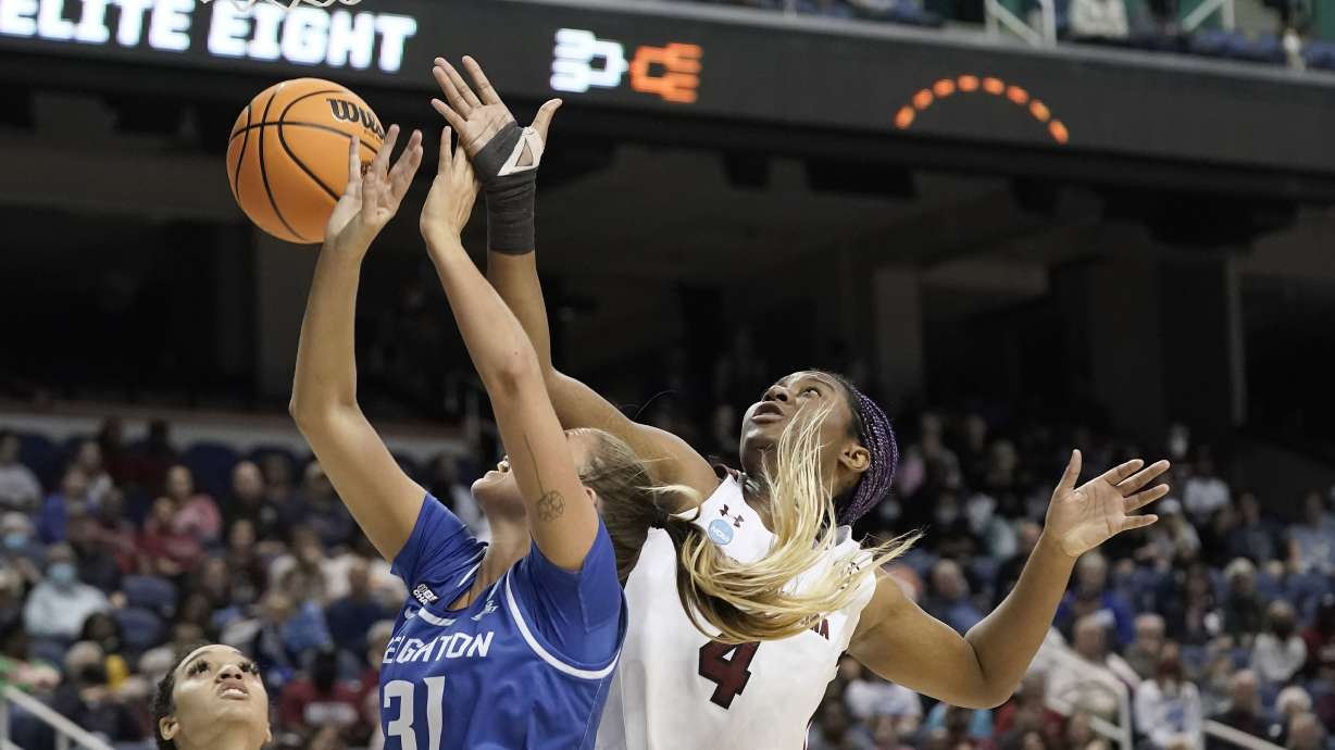 South Carolina forward Aliyah Boston (4) blocks Creighton forward Emma Ronsiek (31) during the first half of a college basketball game in the Elite 8 round of the NCAA tournament in Greensboro, N.C., Sunday, March 27, 2022.