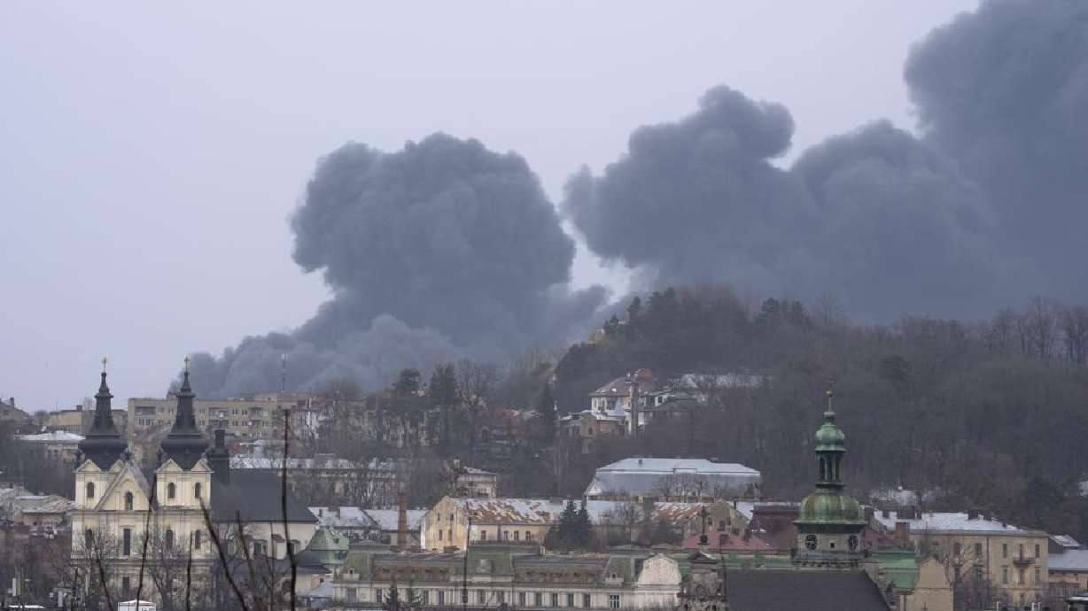 Smoke rises in the air in Lviv, western Ukraine, Saturday. Russia has increasingly focused on grinding down Ukraine’s military in the east in the hope of forcing Kyiv into surrendering part of the country’s eastern territory to end the war.