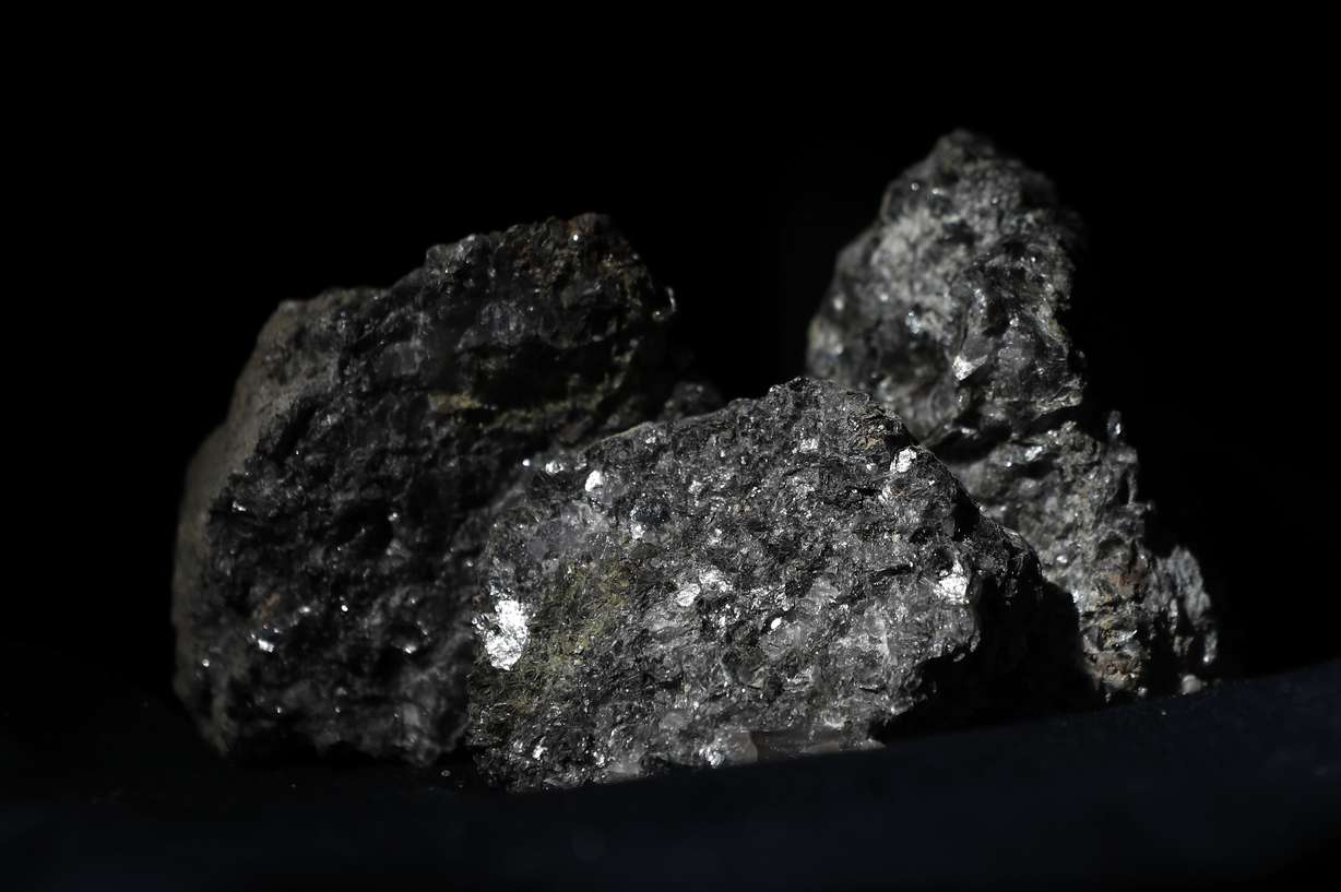 Pieces of lithium sparkle in an ore sample in Prague, Czech Republic, on March 28, 2017.