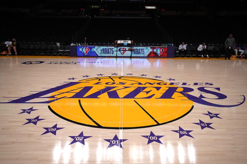 Mar 23, 2022; Los Angeles, California, USA; The Los Angeles Lakers logo at center court before the game between Philadelphia 76ers and Los Angeles Lakers at Crypto.com Arena. Kirby Lee-USA TODAY Sports