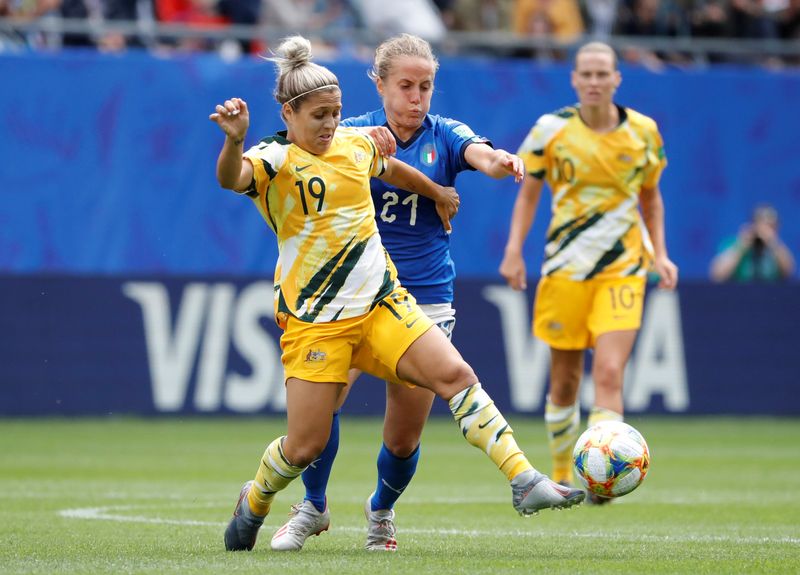 FILE PHOTO: Soccer Football - Women's World Cup - Group C - Australia v Italy - Stade du Hainaut, Valenciennes, France - June 9, 2019  Australia's Katrina Gorry (#19) in action with Italy's Valentina Cernoia.