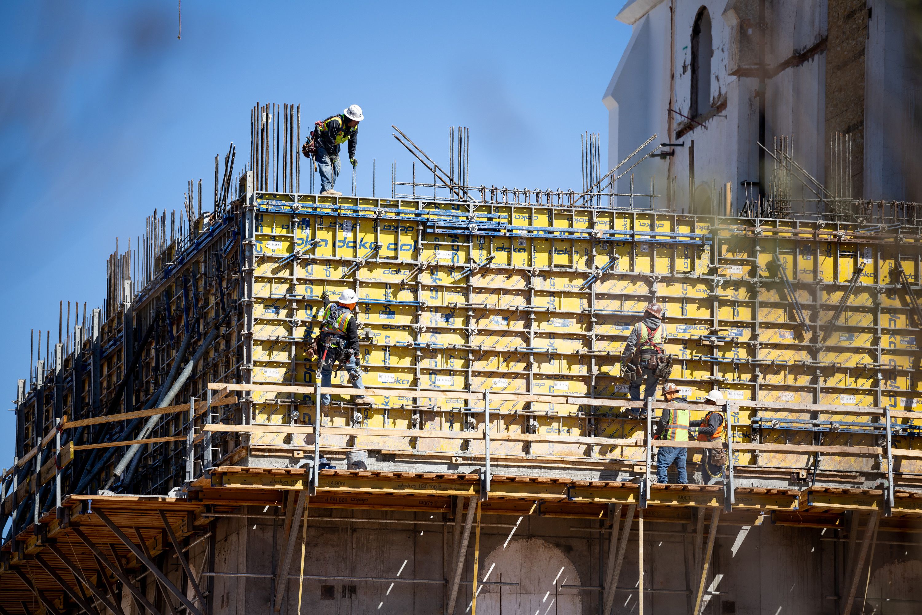 A construction crew works on the St. George Utah Temple of The Church of Jesus Christ of Latter-day Saints, which is closed for renovation, on Friday, March 11.