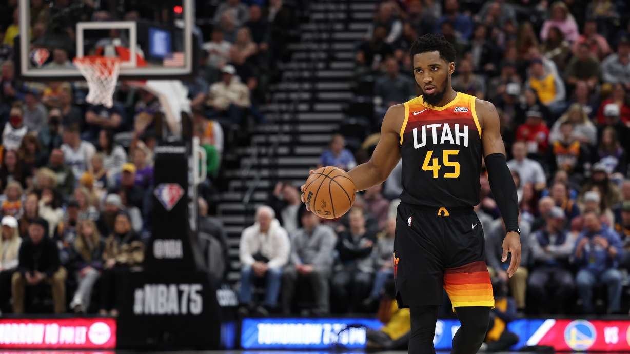 Utah Jazz guard Donovan Mitchell (45) brings the ball up court during a game. The Jazz have lost four in a row.