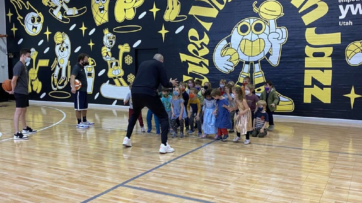 YWCA youth participate in a basketball clinic with the Utah Jazz youth coaches and staff Tuesday.