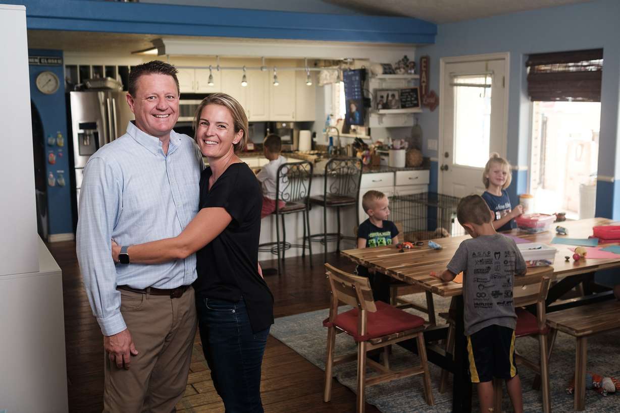 Dr. David Grygla, left, hospitalist at a local St. George hospital, and his wife, Julie, pose for a portrait at their home in St. George on Aug. 19, 2021, with their children Jonathan, Emily, Brady, Abraham, Christian and Eliza.