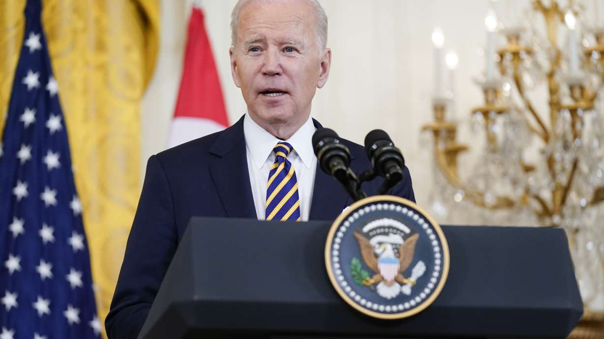 President Joe Biden speaks alongside Singapore's Prime Minister Lee Hsien Loong in the East Room of the White House, Tuesday in Washington. The Biden administration is launching what it says is a one-stop website that will help people in the United States access COVID-19 tests, vaccines and treatments, along with status updates on infection rates where they live.