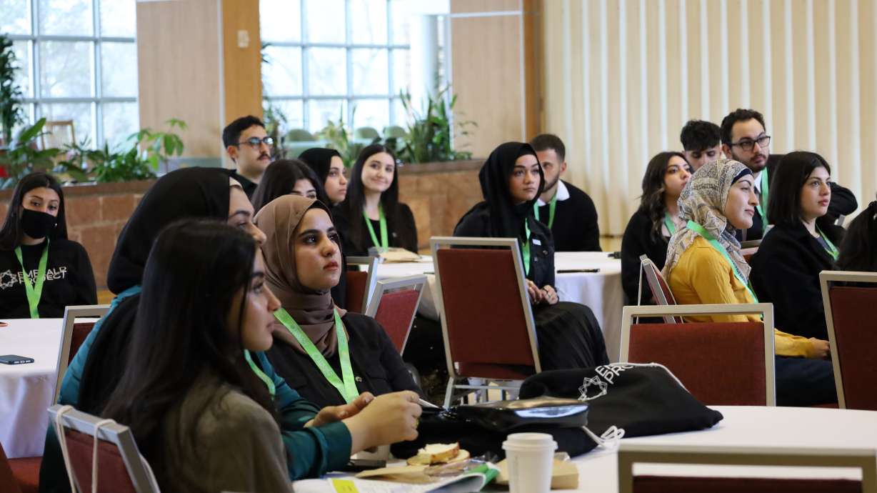 A group of Muslim youth listen to a presentation at the Muslim Youth Conference hosted by Emerald Project on Tuesday.