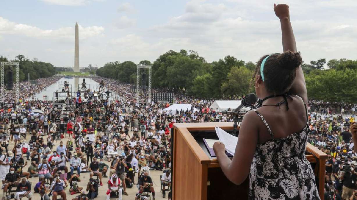 Yolanda Renee King, granddaughter of The Rev. Martin Luther King Jr., raises her fist as she speaks during the March on Washington, on the 57th anniversary of the Rev. Martin Luther King Jr.'s "I Have a Dream" speech on Aug. 28, 2020. California's task force on reparations is at a crossroads with members divided on which Black Americans should be eligible for compensation.