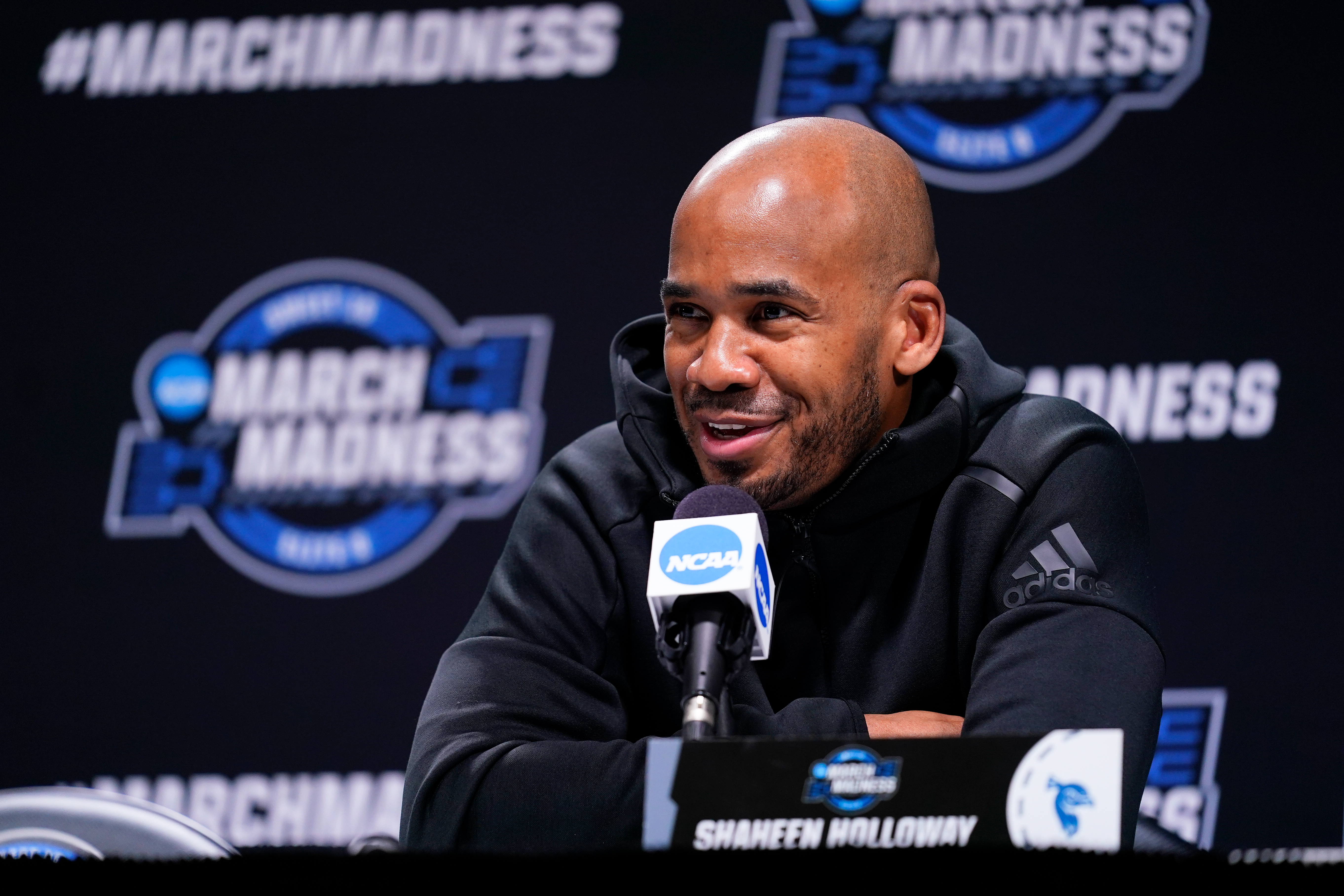 Saint Peter's head coach Shaheen Holloway speaks with members of the media during a news conference for the NCAA men's college basketball tournament, Saturday, March 26, 2022, in Philadelphia. 