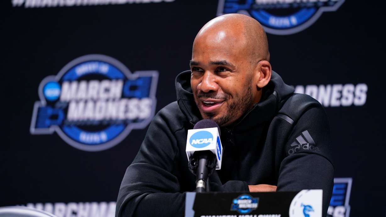 Saint Peter's head coach Shaheen Holloway speaks with members of the media during a news conference for the NCAA men's college basketball tournament, Saturday, March 26, 2022, in Philadelphia.