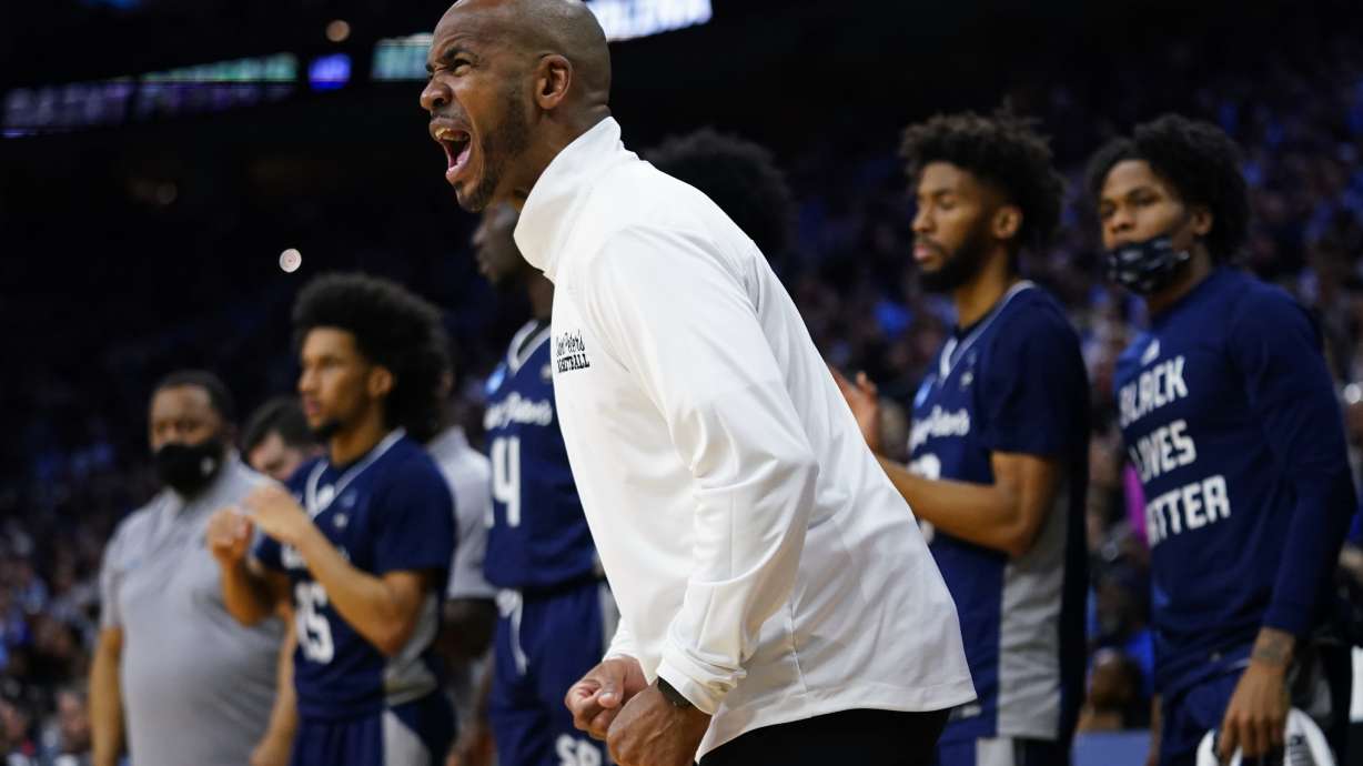 St. Peter's head coach Shaheen Holloway reacts during the first half of a college basketball game against North Carolina in the Elite 8 round of the NCAA tournament, Sunday, March 27, 2022, in Philadelphia.