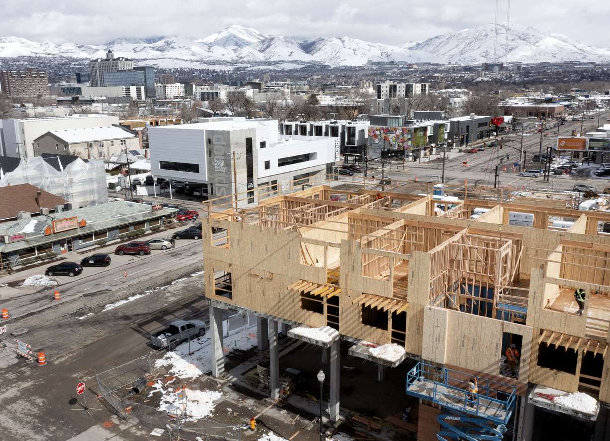 Construction of an apartment building in the Granary District in Salt Lake City progresses on Wednesday, March 9. Researchers and economists are warning they are seeing signs of a housing bubble brewing.