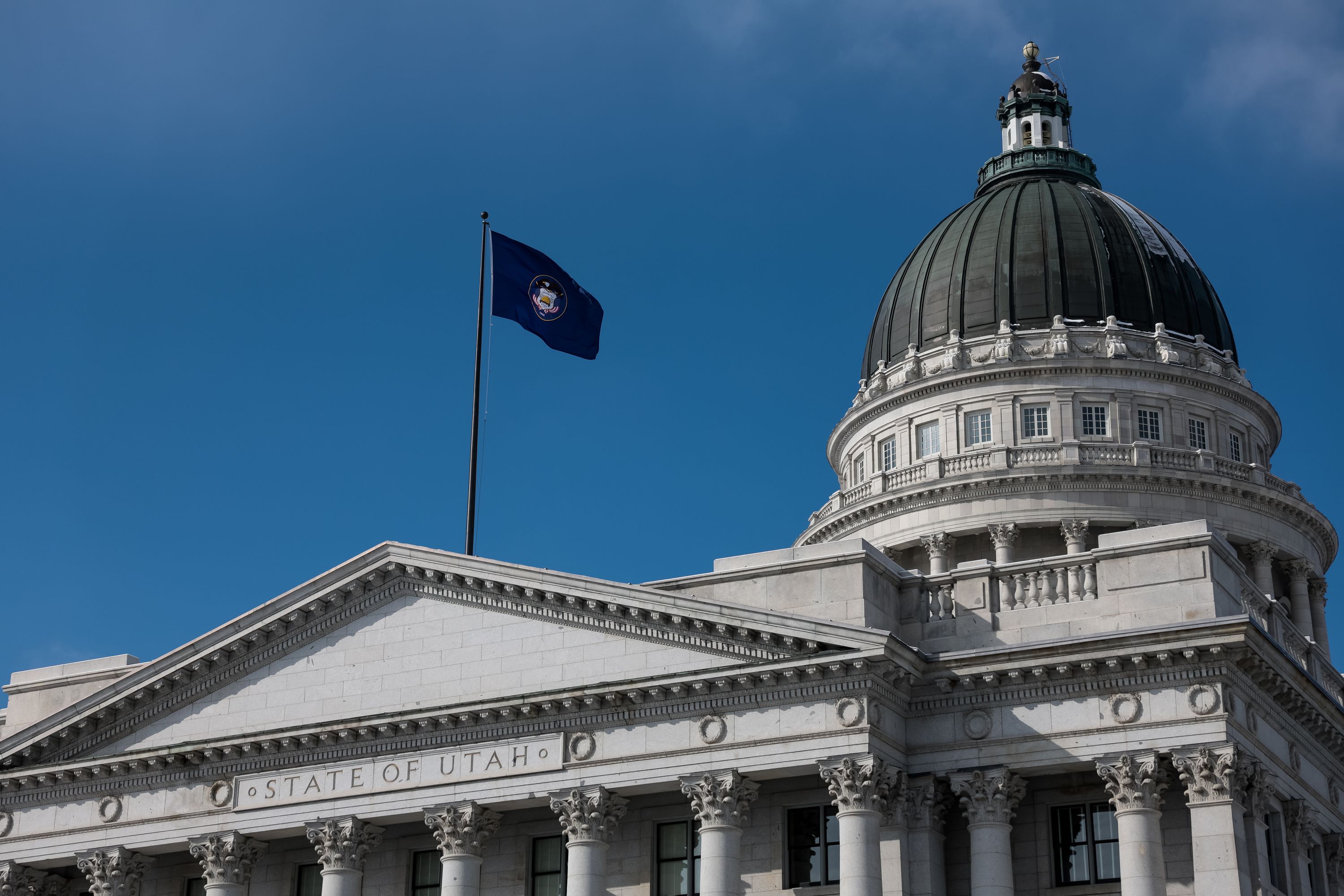 A state flag flutters in the breeze outside of the Capitol in Salt Lake City on Thursday, Feb. 24. In the eyes of Utahns, only one group has more influence than Utah’s governor — and that’s the leaders of the Utah Legislature, a new poll says.