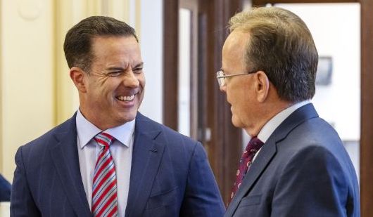 House Speaker Brad Wilson, R-Kaysville, left, and Senate President Stuart Adams, R-Layton, talk prior to a panel discussion on the 2022 legislative session at the Thomas S. Monson Center in Salt Lake City on Tuesday, March 8. In the eyes of Utahns, only one group has more influence than Utah’s governor — and that’s the leaders of the Utah Legislature. That’s according to a new Deseret News/Hinckley Institute of Politics poll.