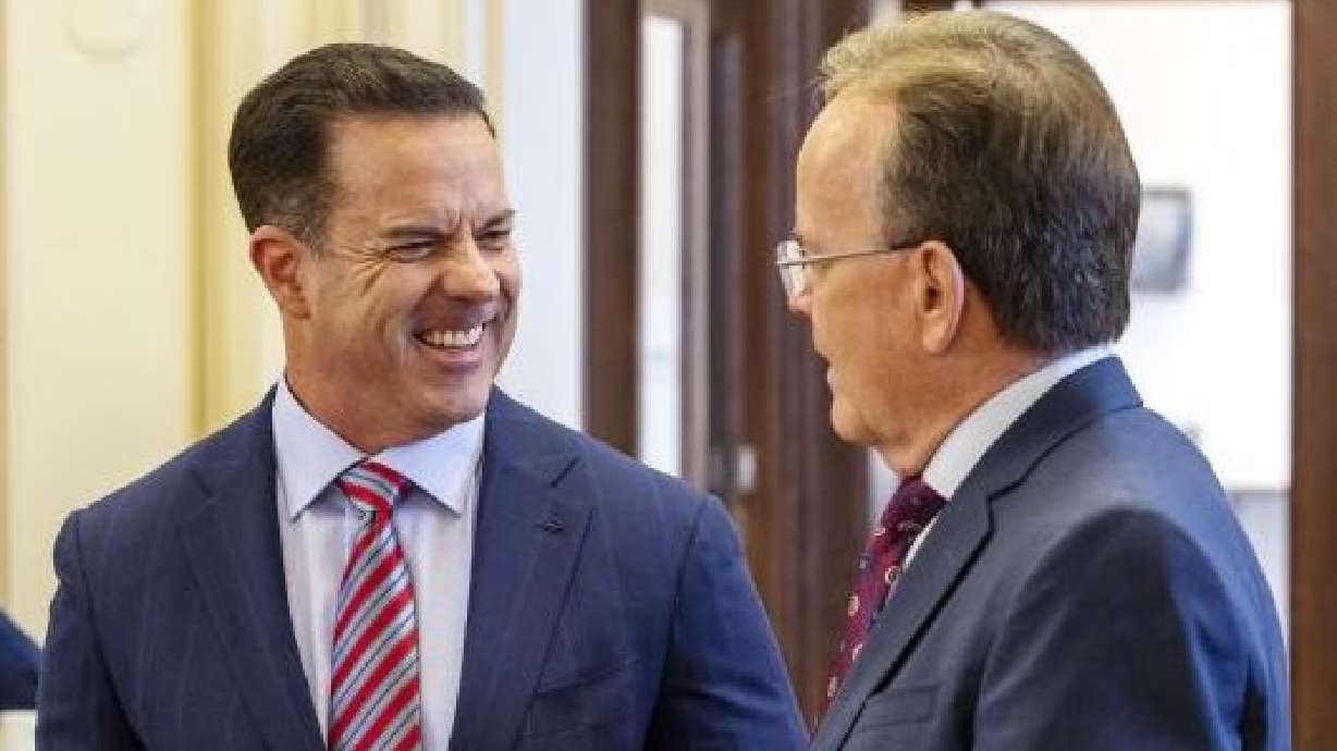 House Speaker Brad Wilson, R-Kaysville, left, and Senate President Stuart Adams, R-Layton, talk prior to a panel discussion on the 2022 legislative session at the Thomas S. Monson Center in Salt Lake City on Tuesday, March 8. In the eyes of Utahns, only one group has more influence than Utah’s governor — and that’s the leaders of the Utah Legislature. That’s according to a new Deseret News/Hinckley Institute of Politics poll.