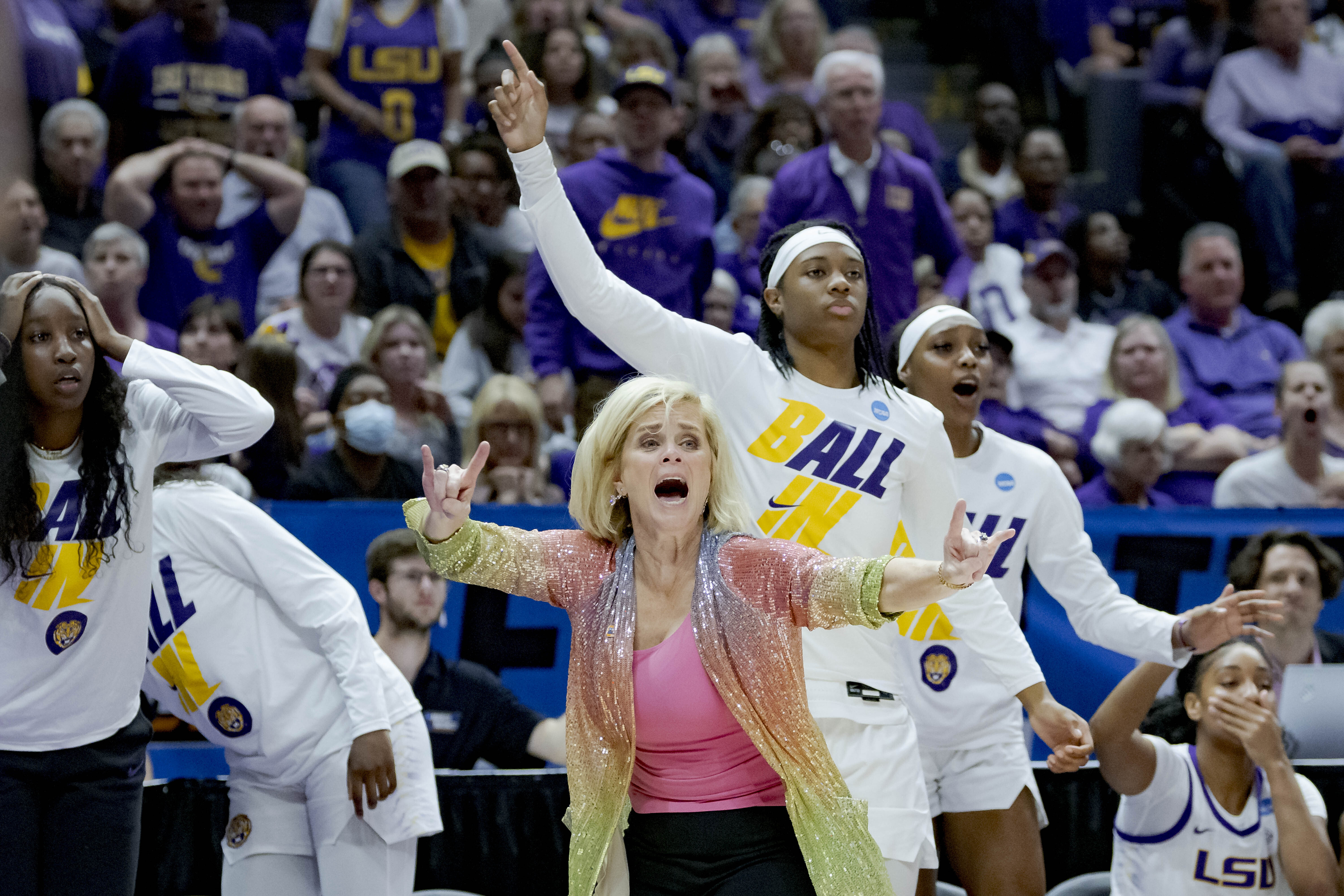 LSU head coach Kim Mulkey, center front, reacts to a call during the second half of a women's college basketball game against Ohio State in the second round of the NCAA tournament, Monday, March 21, 2022, in Baton Rouge, La. 