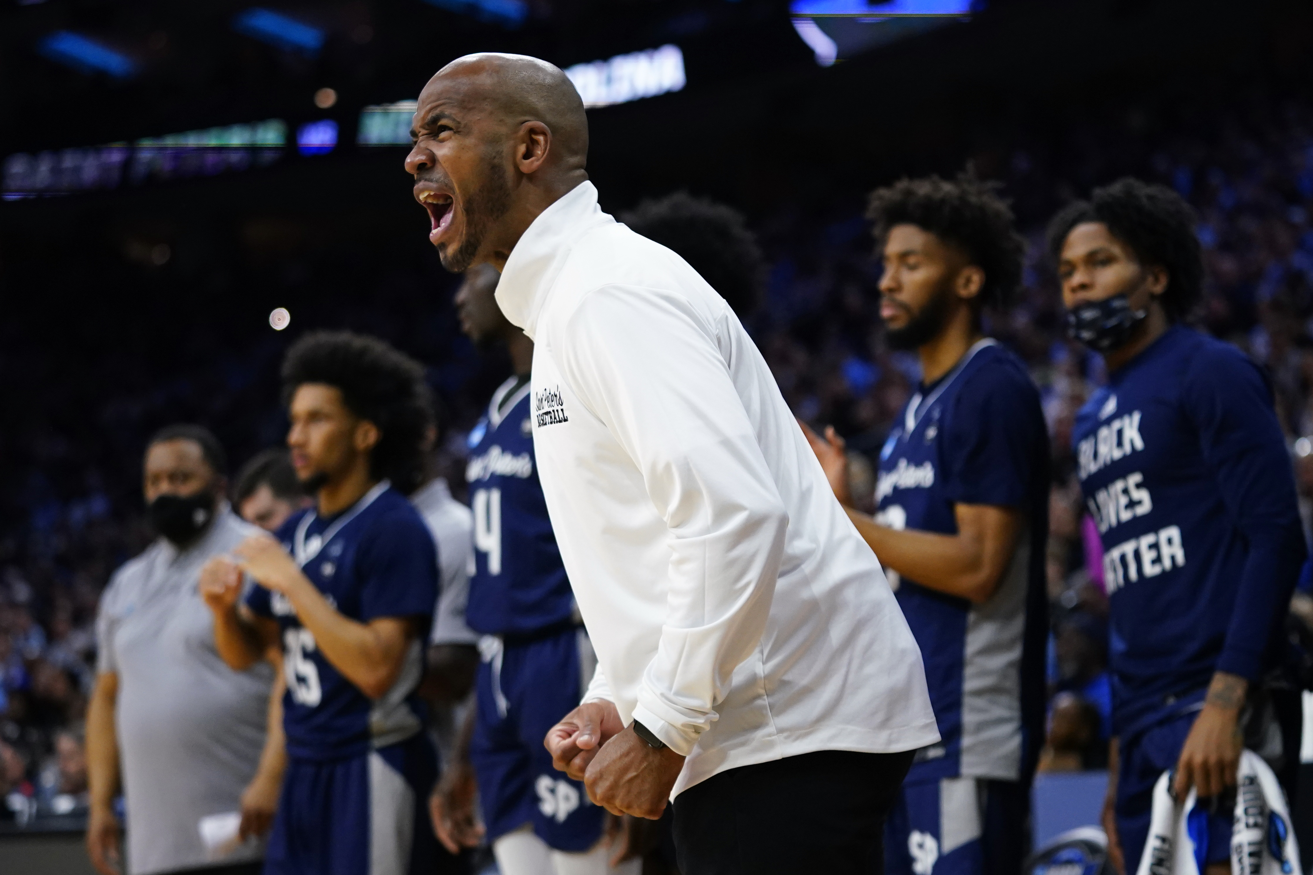 St. Peter's head coach Shaheen Holloway reacts during the first half of a college basketball game against North Carolina in the Elite 8 round of the NCAA tournament, Sunday, March 27, 2022, in Philadelphia. 