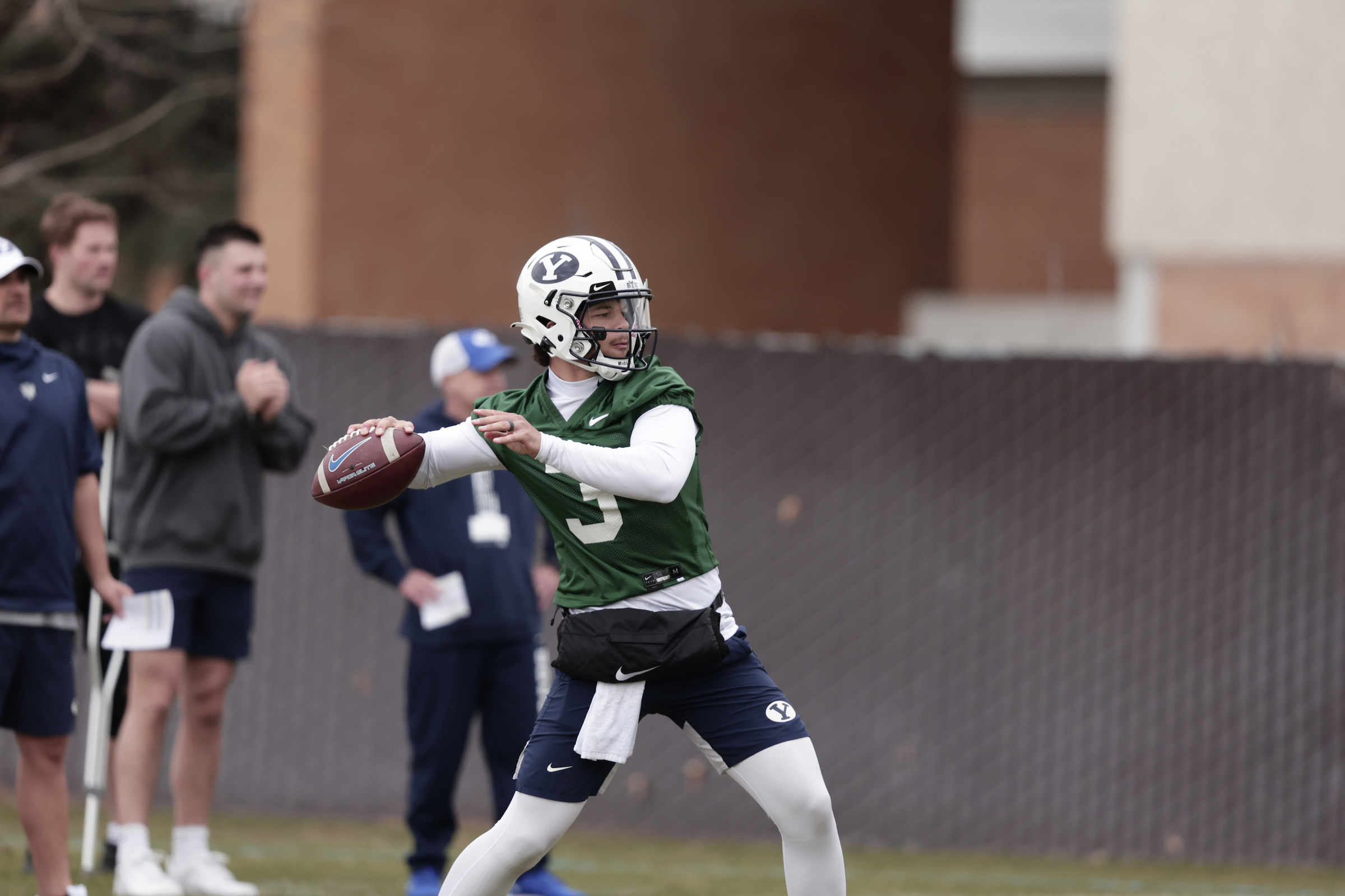 BYU quarterback Jaren Hall attempts a pass during spring practices, Thursday, March 31, 2022 in Provo.