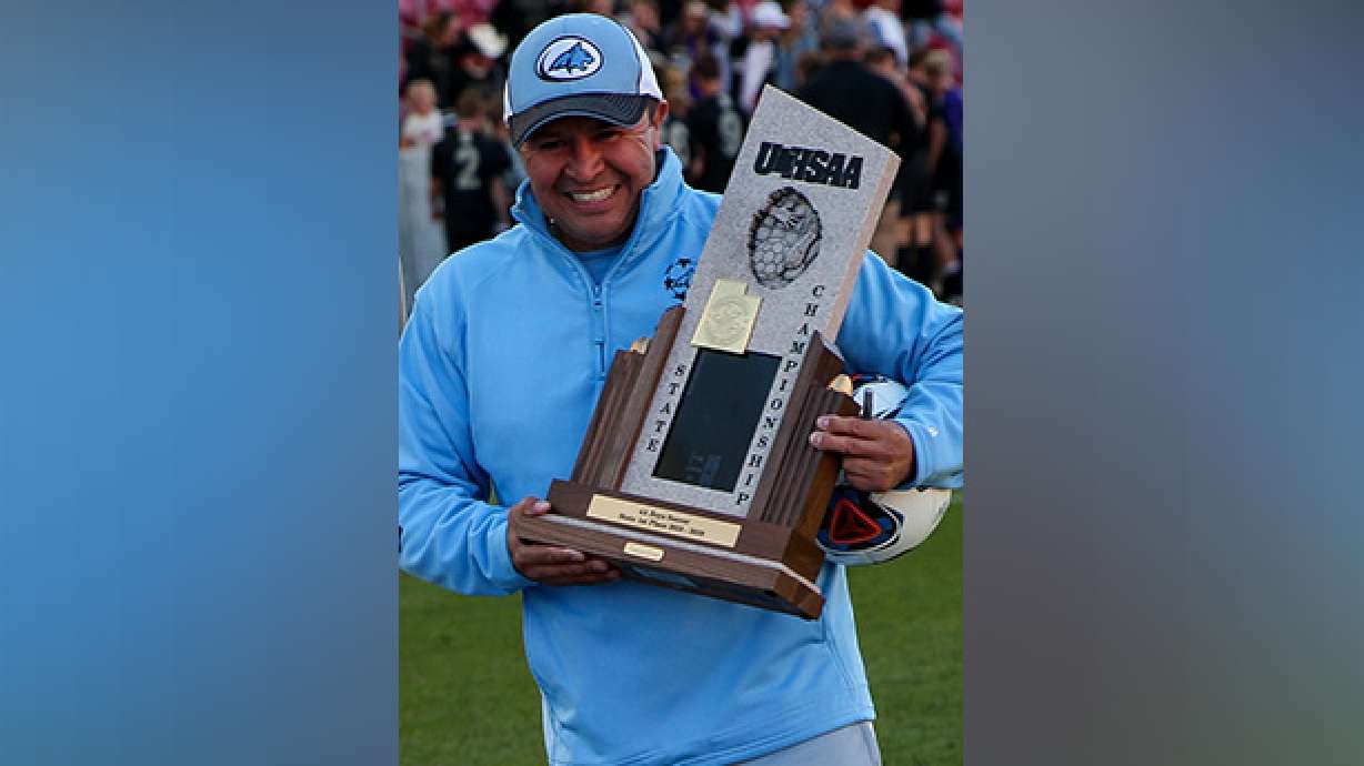Former Sky View High School soccer coach Jorge Alejandro Cruz is pictured celebrating a win. Cruz was sentenced to one year in jail after pleading guilty to enticing a minor by internet or text.