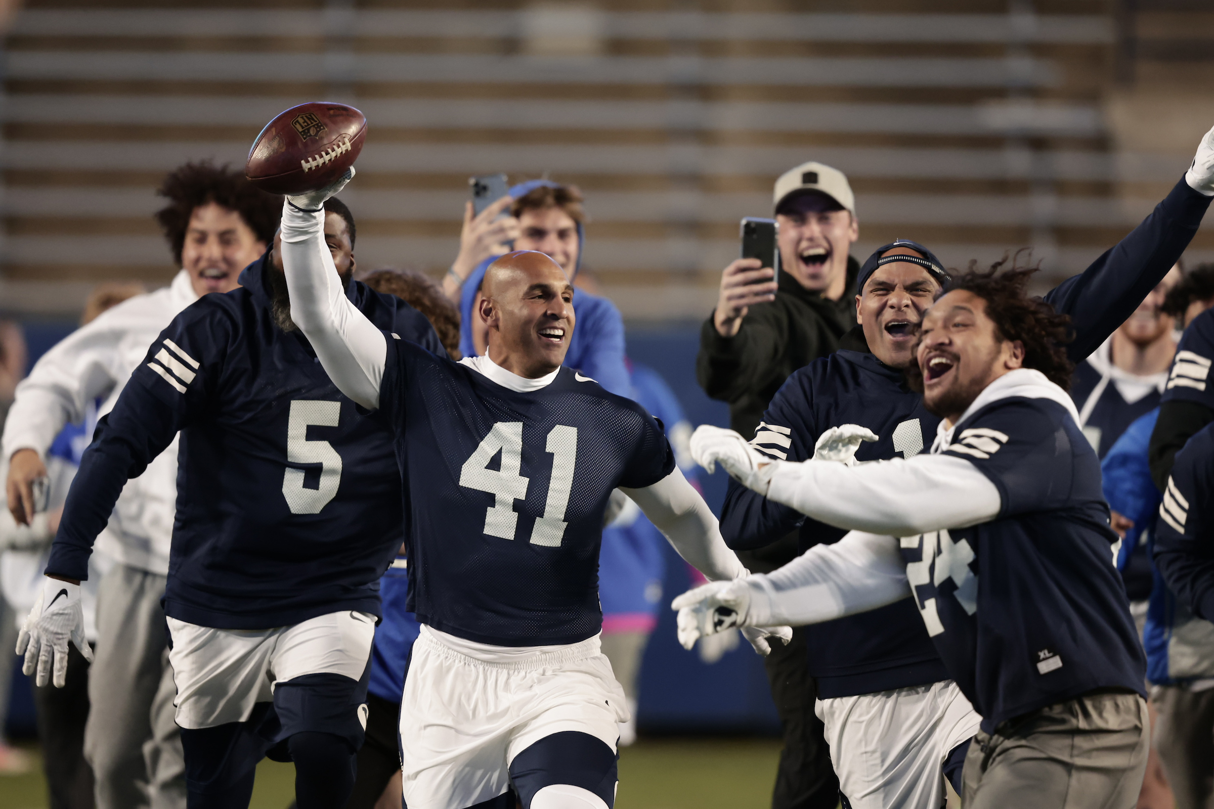 Former BYU football players participate in the alumni game at LaVell Edwards Stadium, March 31, 2022 in Provo.
