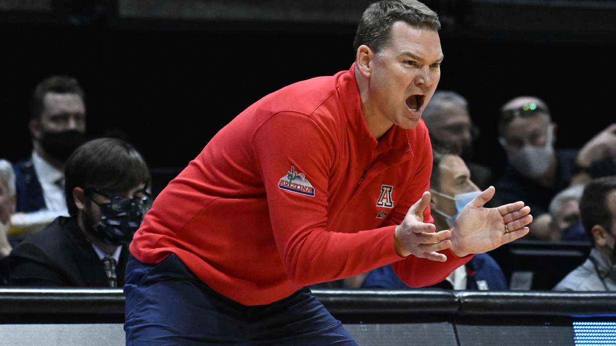 Arizona head coach Tommy Lloyd calls to his team during the first half of a second-round NCAA college basketball tournament game against TCU, Sunday, March 20, 2022, in San Diego.