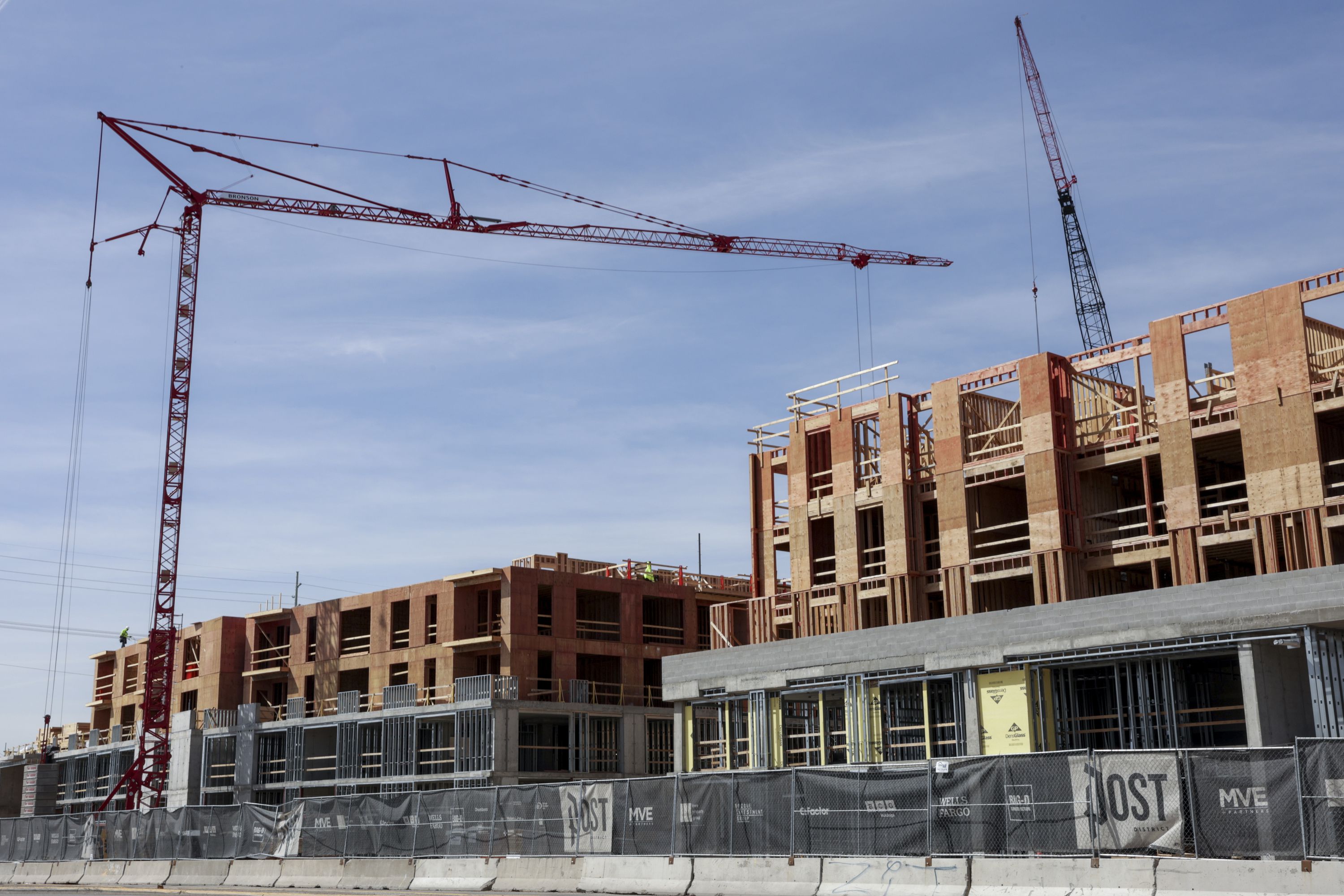 Apartment buildings under construction on 500 South and 600 West in Salt Lake City are pictured on Friday, April 1, 2022.