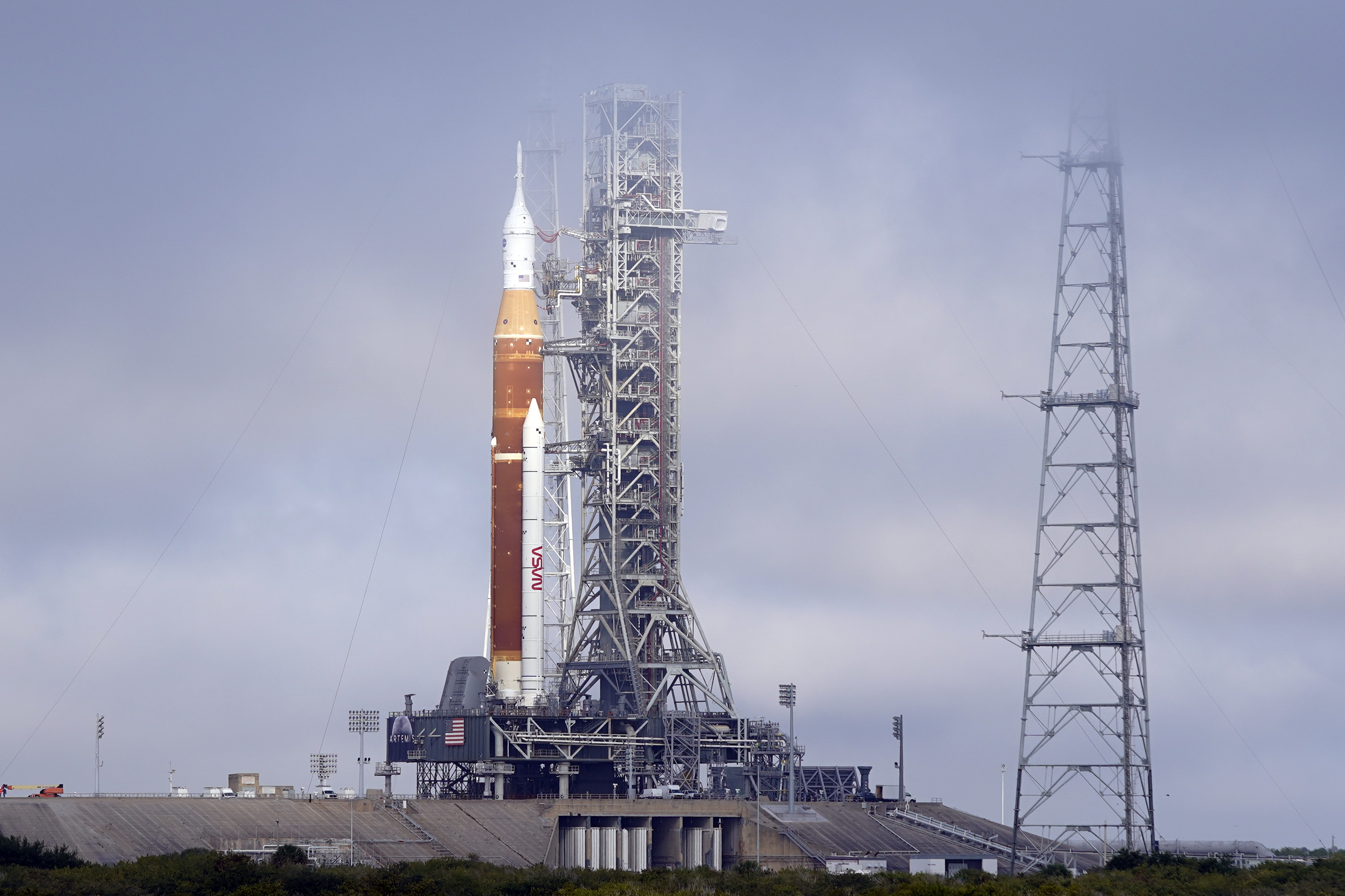 The NASA Artemis rocket with the Orion spacecraft aboard stands on pad 39B at the Kennedy Space Center in Cape Canaveral, Fla., March 18. NASA is kicking off a critical countdown test for its new moon rocket. The two-day dress rehearsal began Friday at Florida's Kennedy Space Center and will culminate Sunday with the loading of the rocket's fuel tanks.
