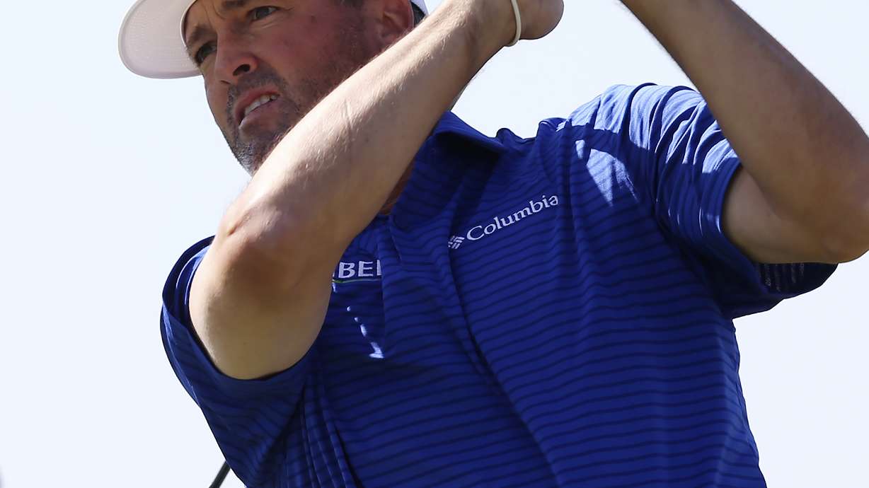 Ryan Palmer watches his shot from the 10th tee during the second day of the Valero Texas Open golf tournament at TPC San Antonio, Friday, April 1, 2022.