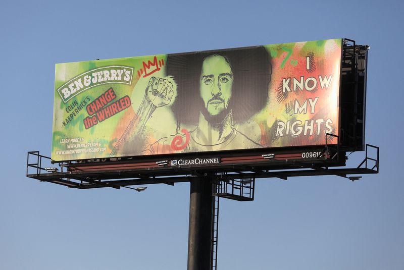 FILE PHOTO: A new billboard by Ben and Jerry’s featuring Colin Kaepernick has been placed near Raymond James Stadium ahead of the weekend's Super Bowl LV between the Kansas City Chiefs and Tampa Bay Buccaneers in Tampa, Florida, U.S., February 5, 2021.