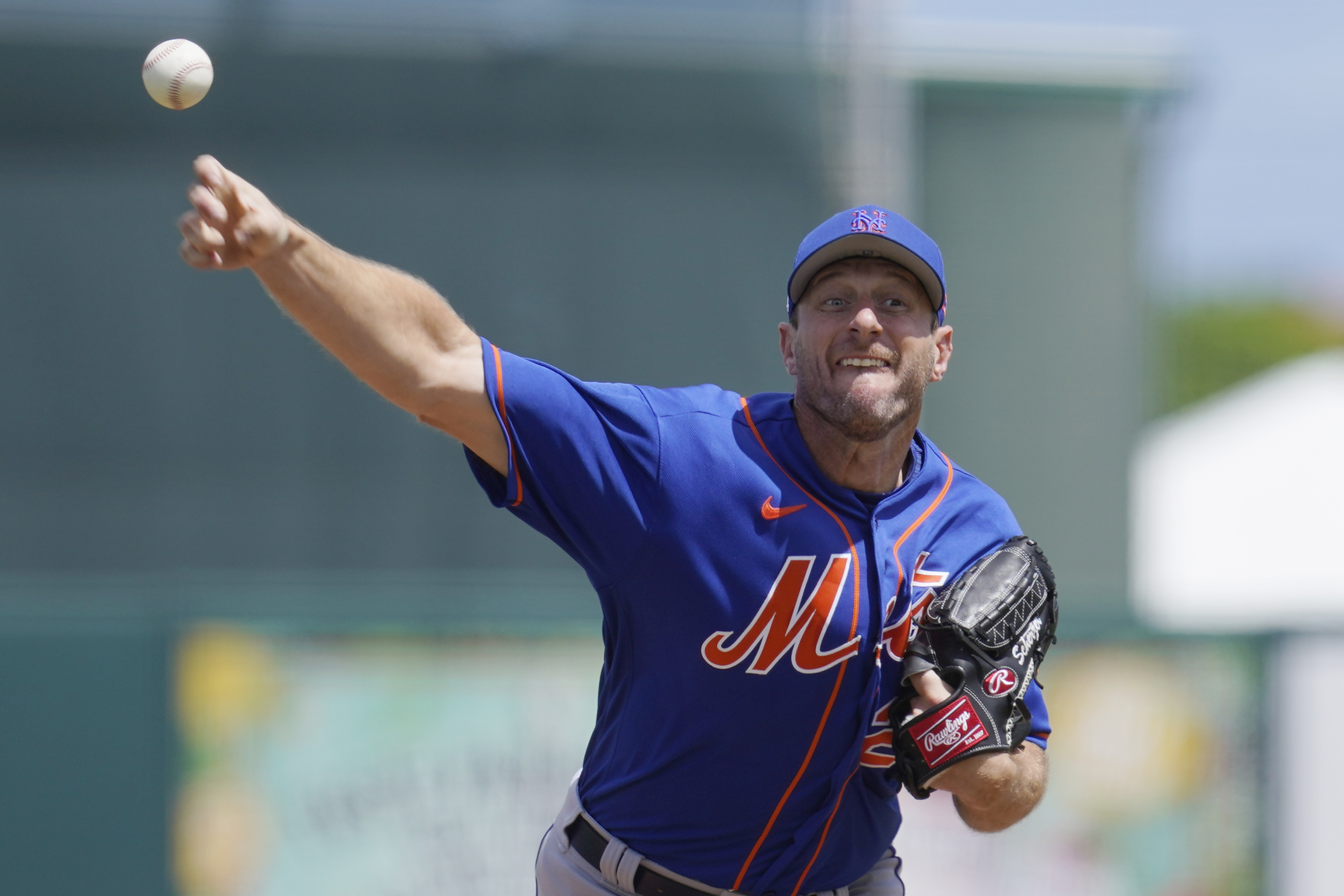 New York Mets' Max Scherzer pitches in the second inning of a spring training baseball game against the Miami Marlins, Monday, March 21, 2022, in Jupiter, Fl. 
