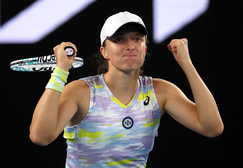 FILE PHOTO: Tennis - Australian Open - Melbourne Park, Melbourne, Australia - January 27, 2022  Poland's Iga Swiatek reacts during her semi final match against Danielle Collins of the U.S.