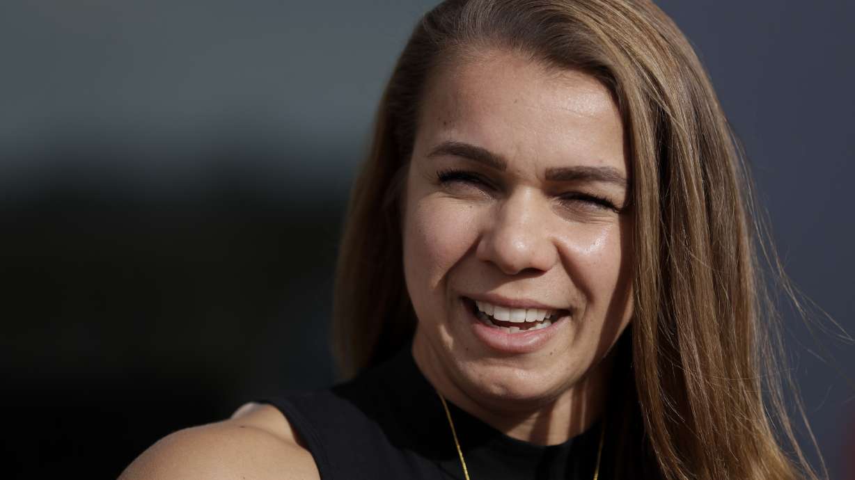 FILE - New York Yankees minor league hitting coach Rachel Balkovec speaks to reporters during the Major League Baseball winter meetings, on Dec. 10, 2019, in San Diego. New York Yankees minor league manager Rachel Balkovec is back on the field, Saturday, April 2, 2022 a week after she was hit in the face by a batted ball during a drill. Balkovec is the first woman to manage a minor league affiliate of a major league team..