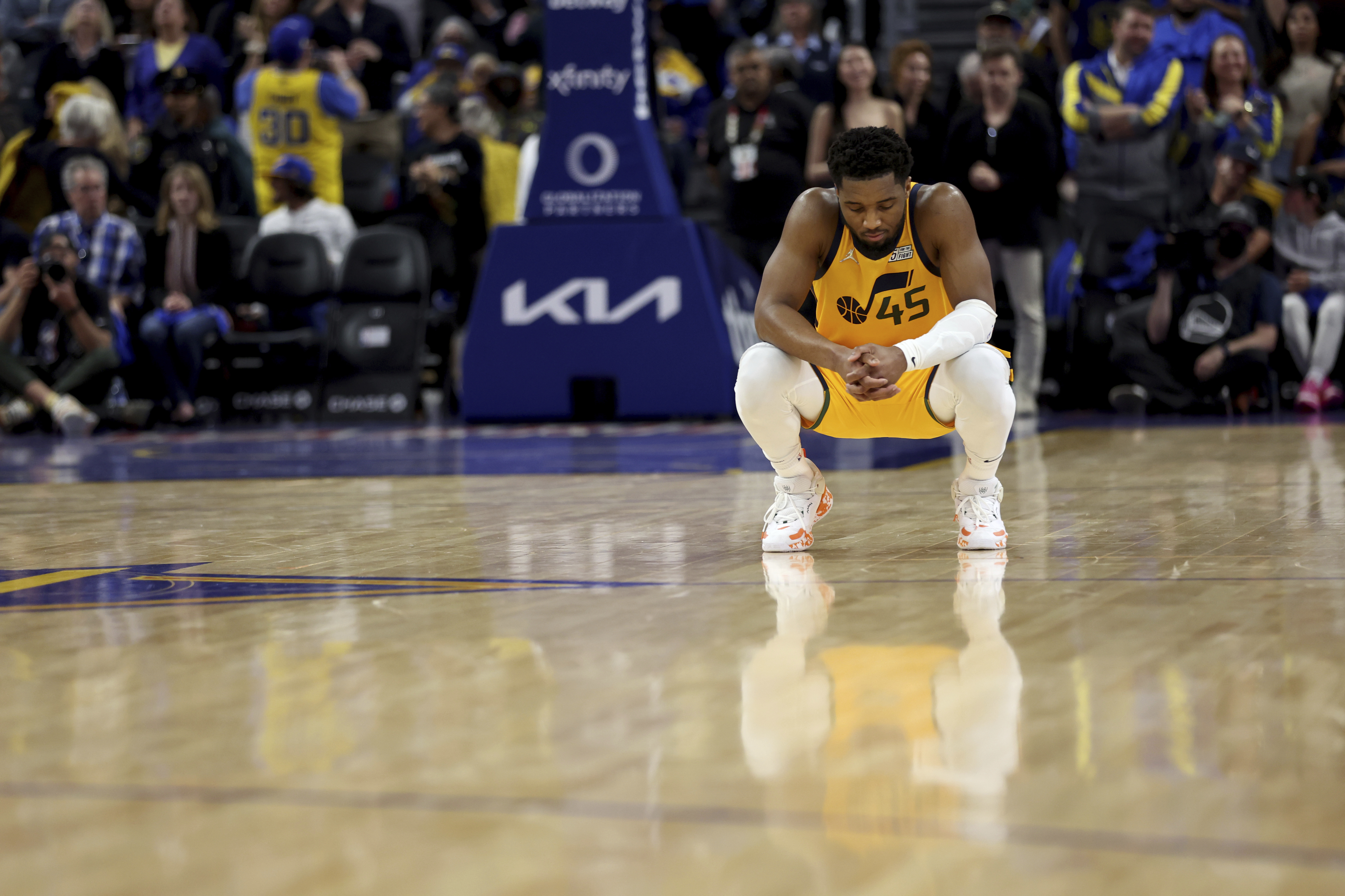 Utah Jazz guard Donovan Mitchell (45) reacts during the second half of an NBA basketball game against the Golden State Warriors in San Francisco, Saturday, April 2, 2022. 