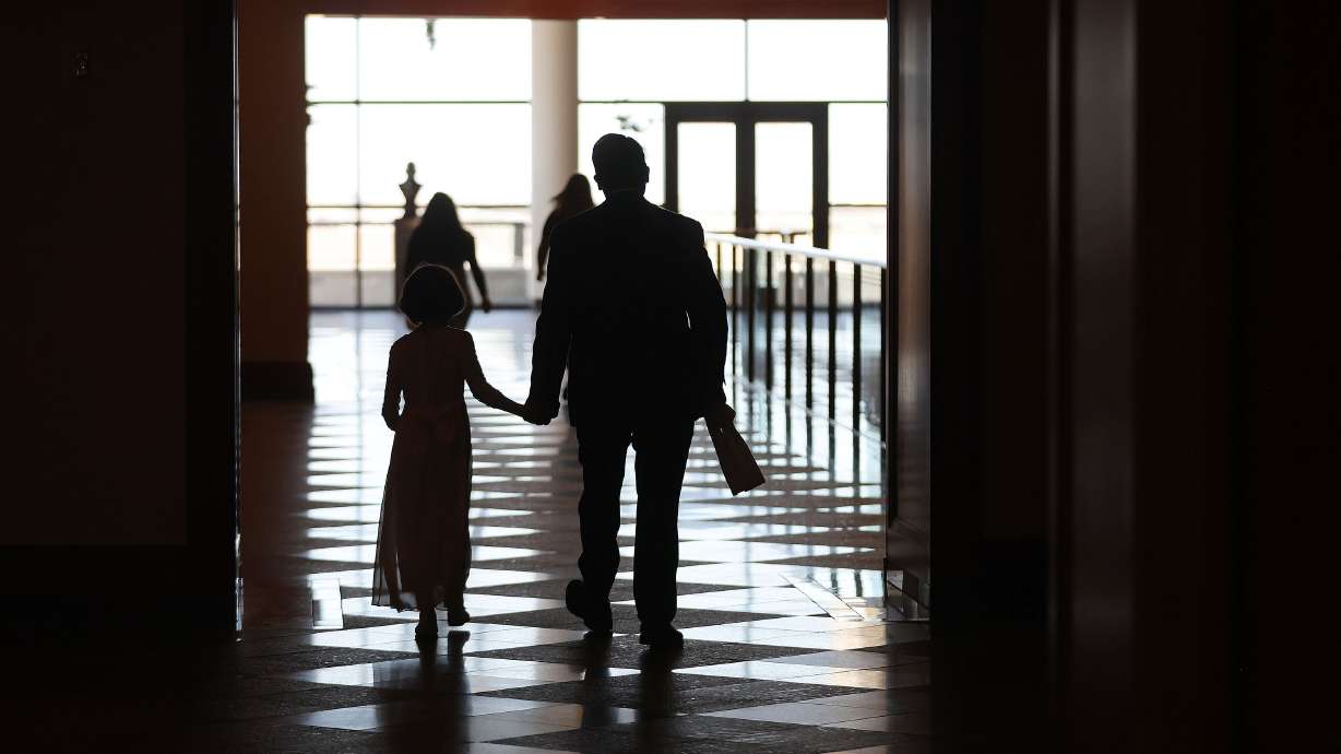 Attendees walk through the conference center during the 192nd Annual General Conference of The Church of Jesus Christ of Latter-day Saints in Salt Lake City on Sunday.