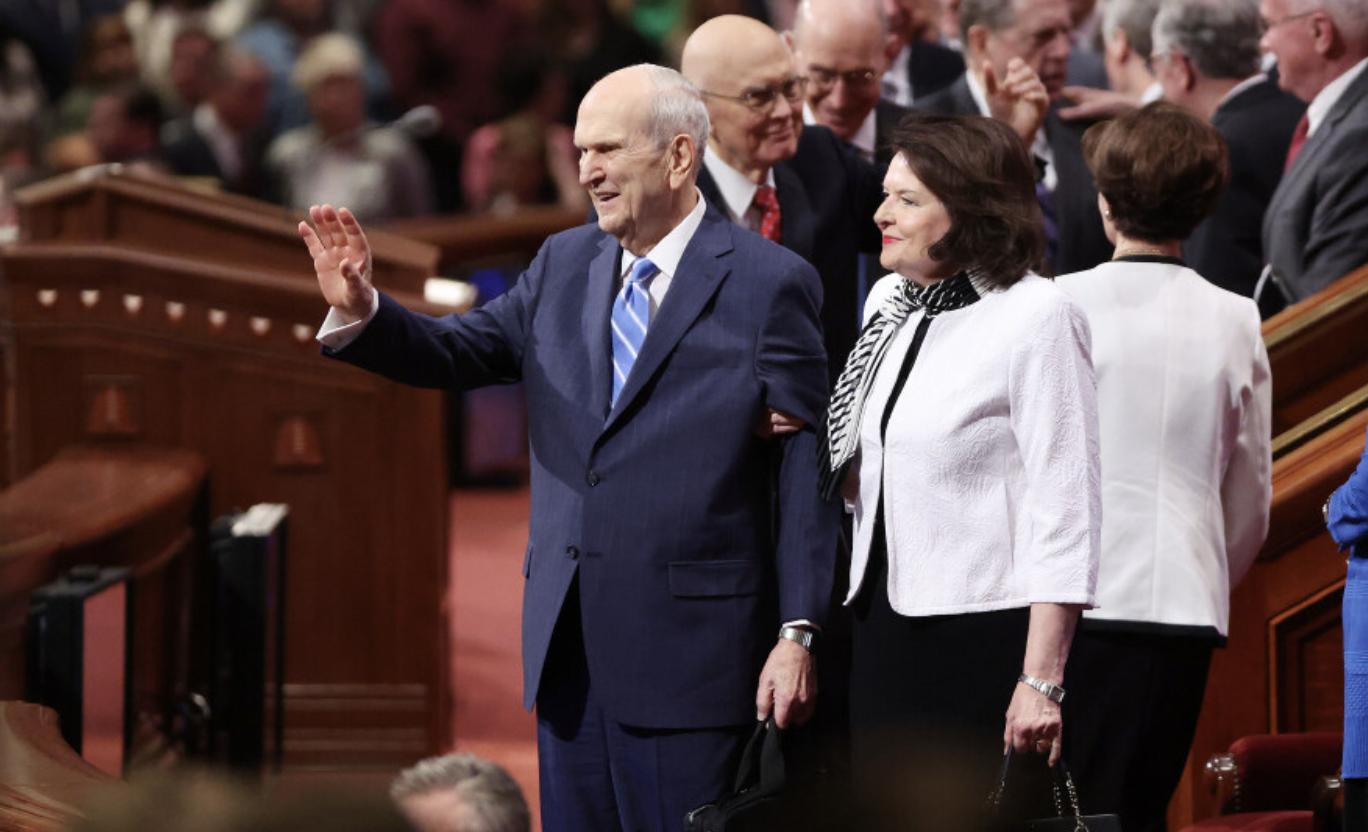 President Russell M. Nelson of The Church of Jesus Christ of Latter-day Saints waves to attendees during the church's Sunday morning session of the 192nd Annual General Conference at the Conference Center, in Salt Lake City on Sunday.