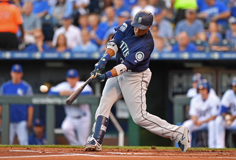 FILE PHOTO: Aug 4, 2017; Kansas City, MO, USA; Seattle Mariners second basemen Robinson Cano (22) hits his 500th career double against the Kansas City Royals during the first inning at Kauffman Stadium.