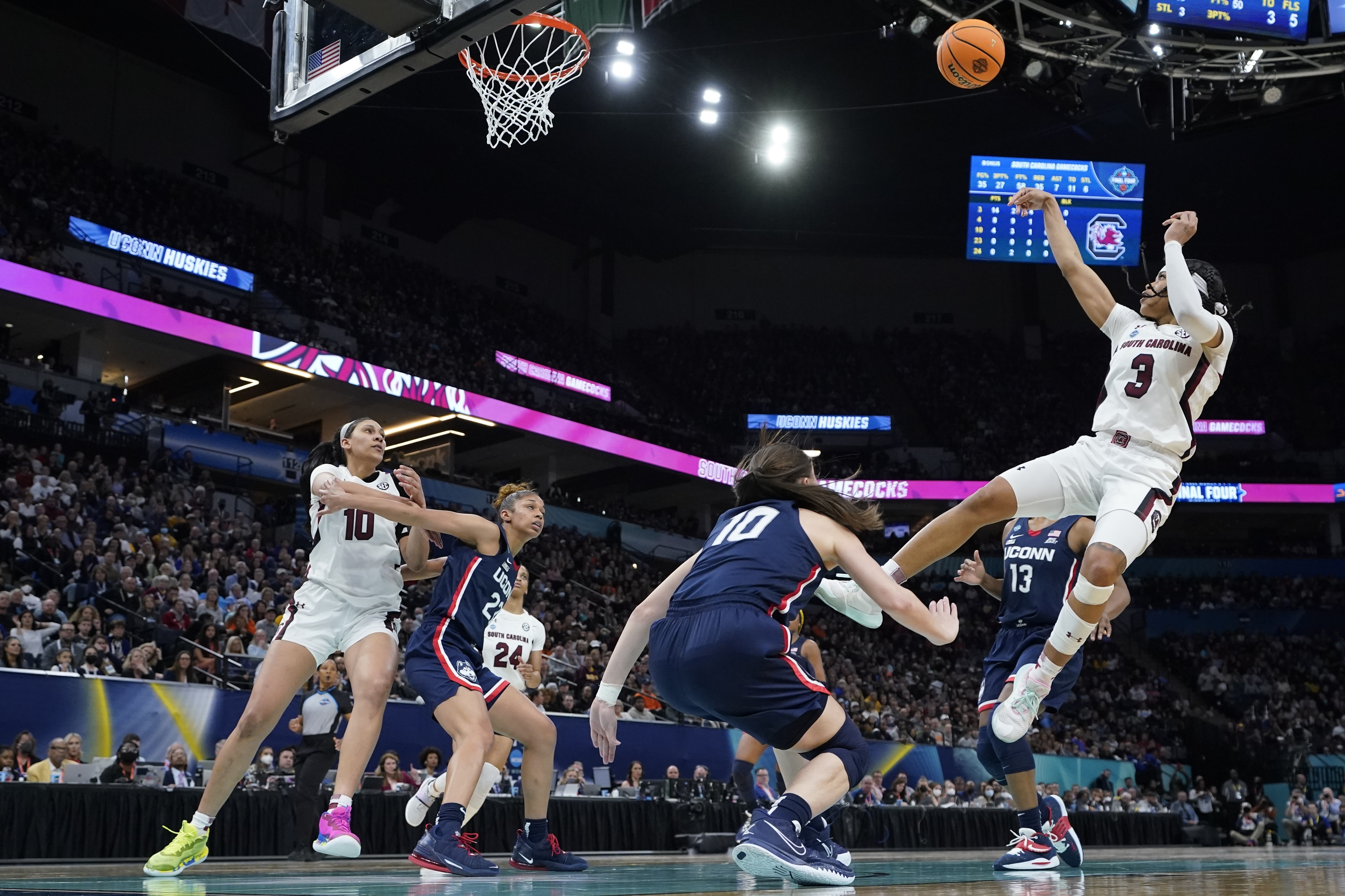 South Carolina's Destanni Henderson shoots during the second half of a college basketball game in the final round of the Women's Final Four NCAA tournament Sunday, April 3, 2022, in Minneapolis.