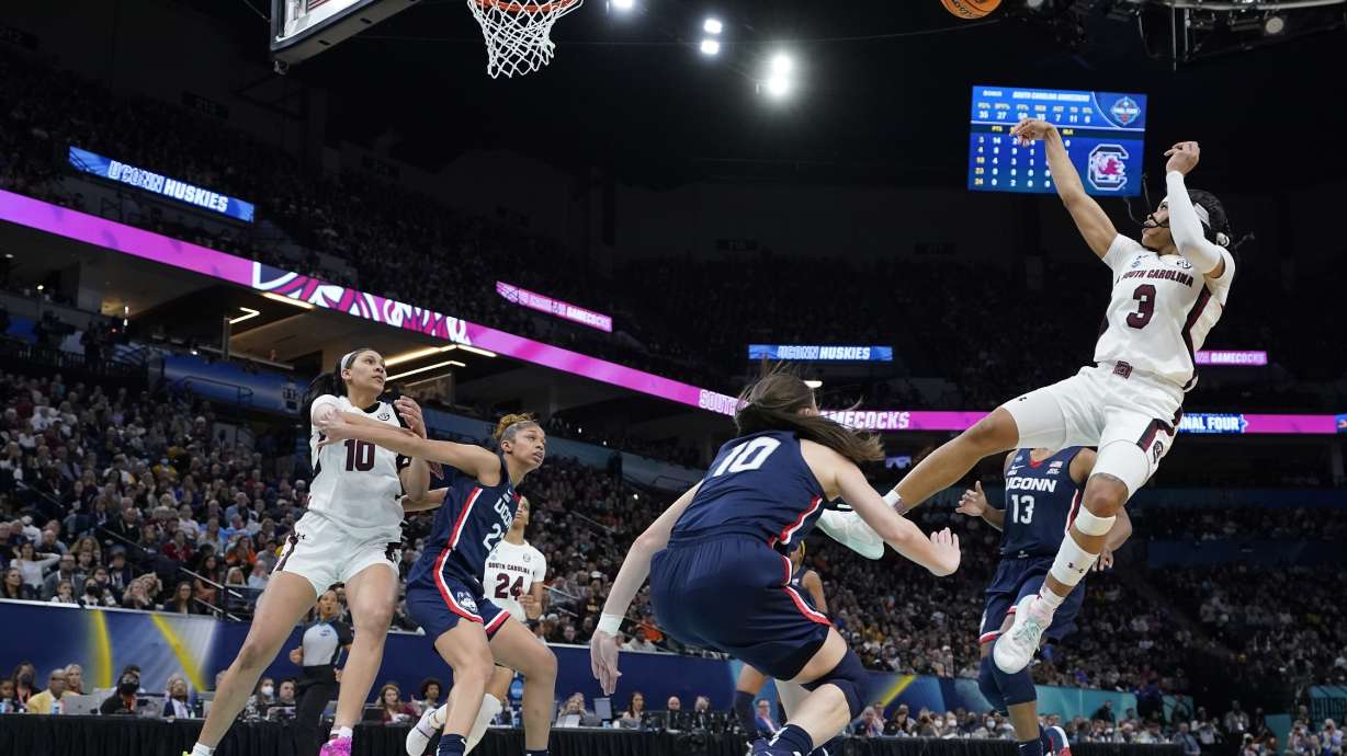 South Carolina's Destanni Henderson shoots during the second half of a college basketball game in the final round of the Women's Final Four NCAA tournament Sunday, April 3, 2022, in Minneapolis.