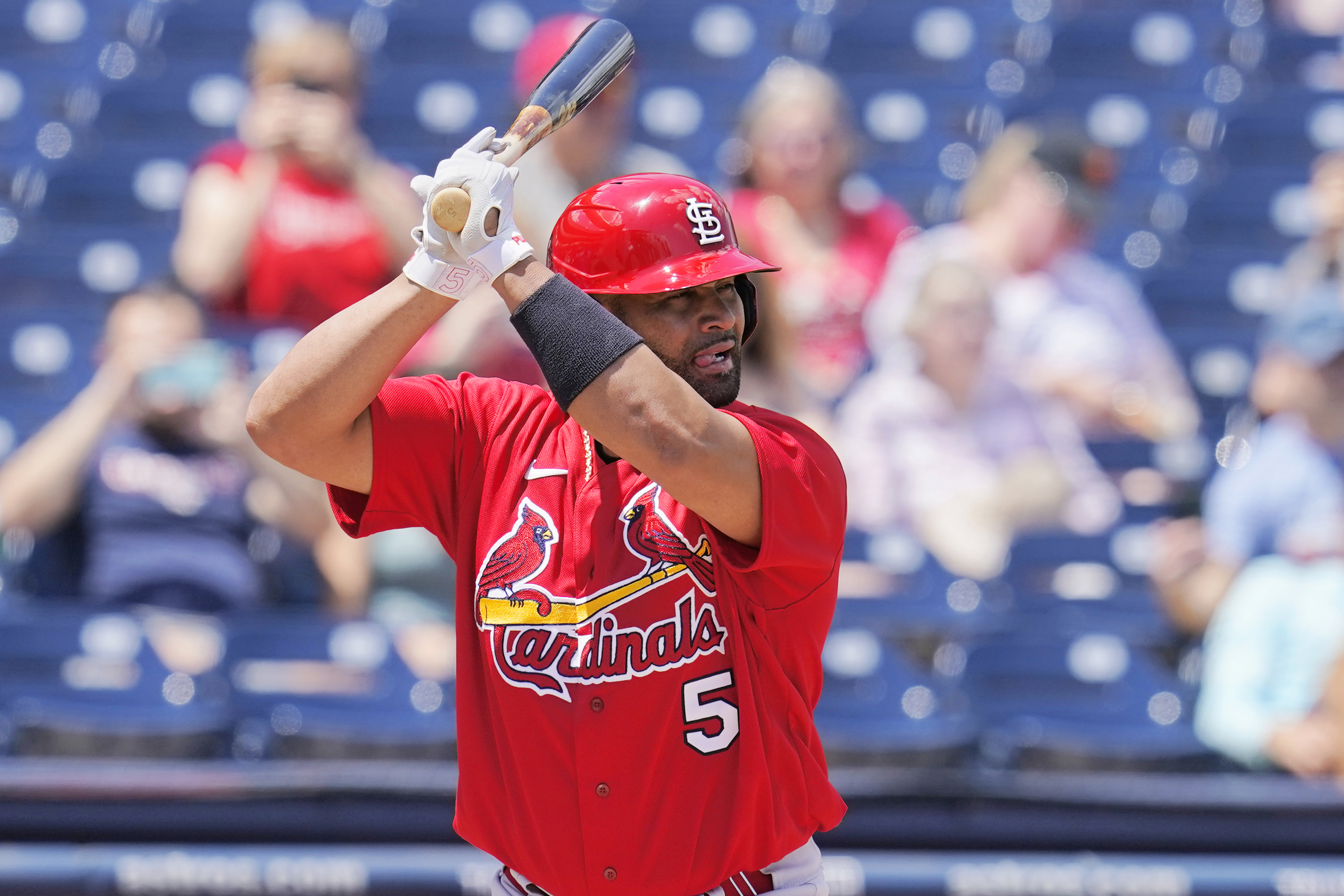 St. Louis Cardinals' Albert Pujols (5) bats in the first inning of a spring training baseball game against the Washington Nationals, Wednesday, March 30, 2022, in West Palm Beach, Fla. 