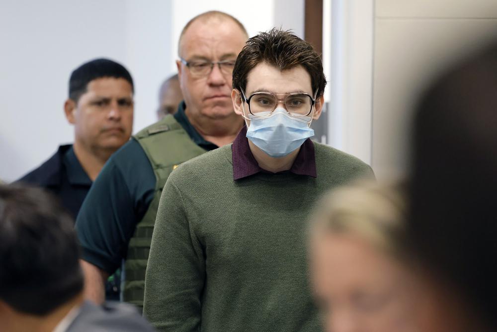 Marjory Stoneman Douglas High School shooter Nikolas Cruz enters the courtroom before jury pre-selection in the penalty phase of his trial at the Broward County Courthouse in Fort Lauderdale, Fla. on Monday.